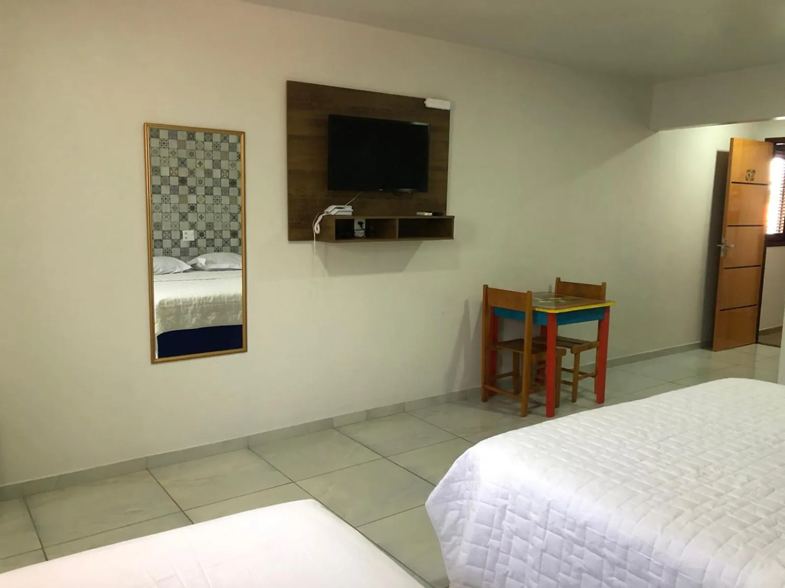 Bed in Pousada Murici