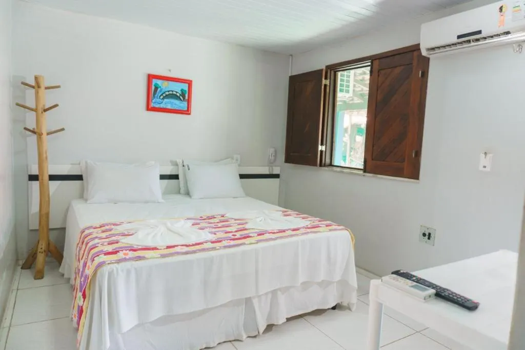 Bed in Pousada Murici