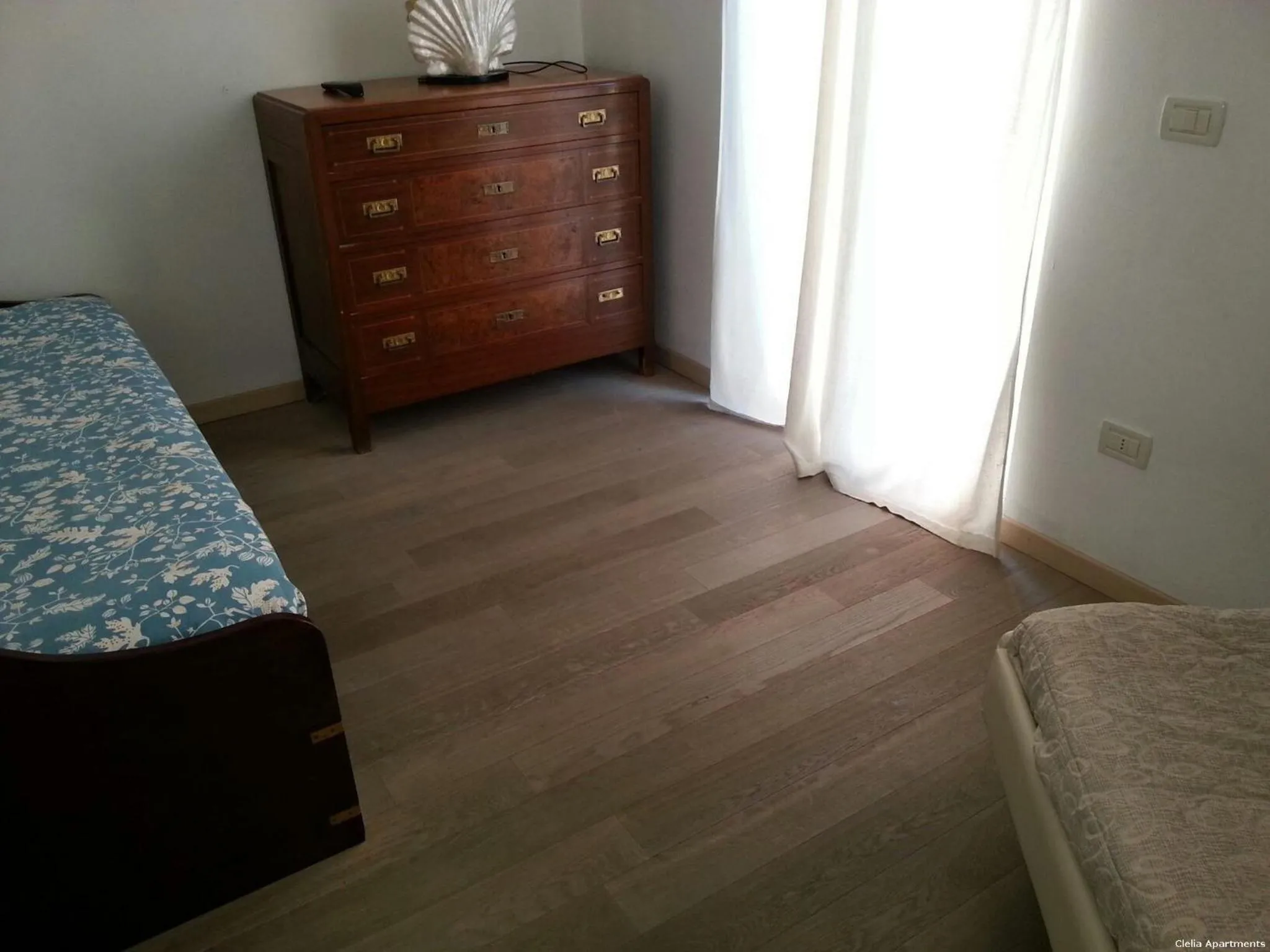 Decorative detail, Bed in Clelia Apartments - Deiva Marina