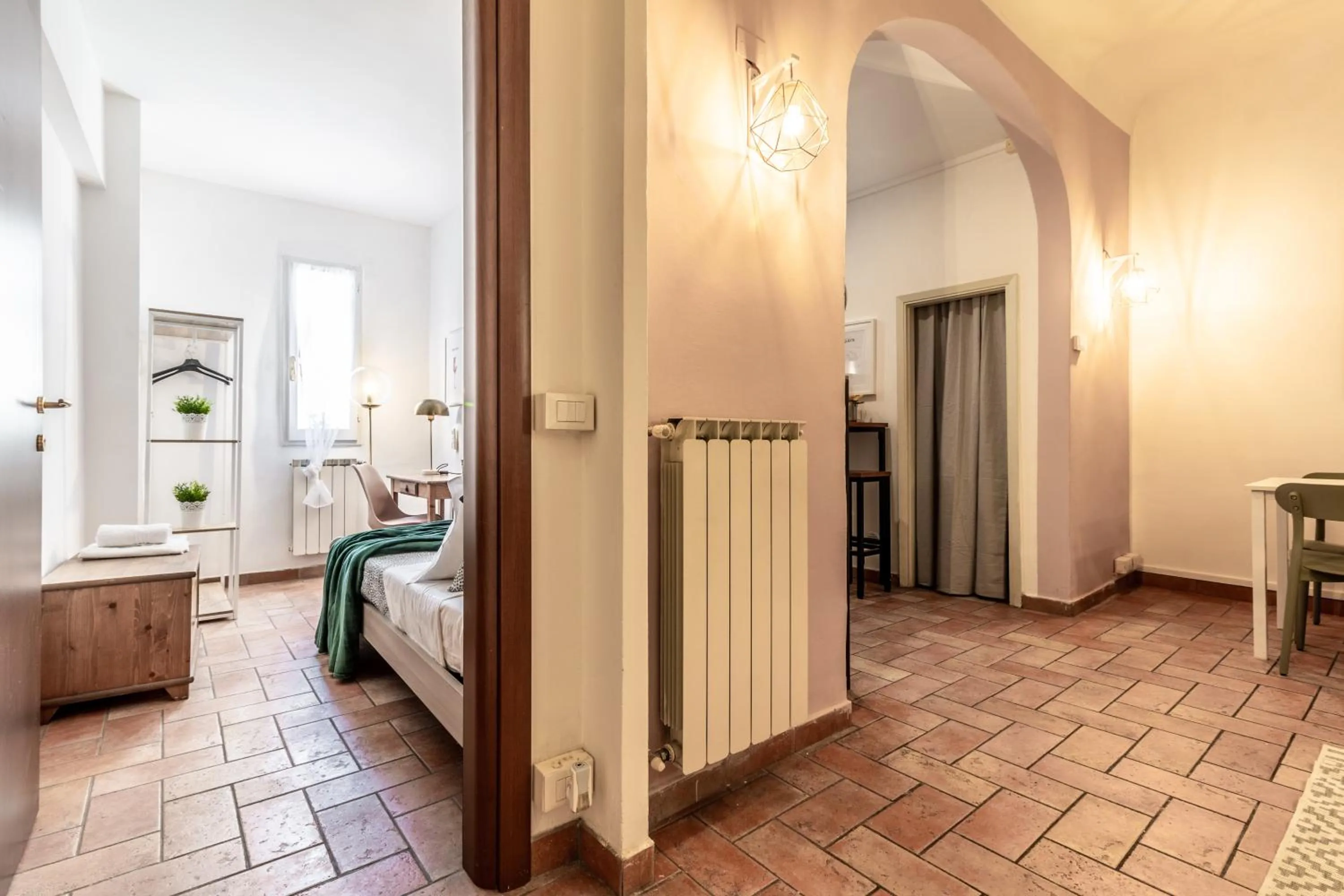 Living room, Bed in Wine Apartments Florence Ansonica