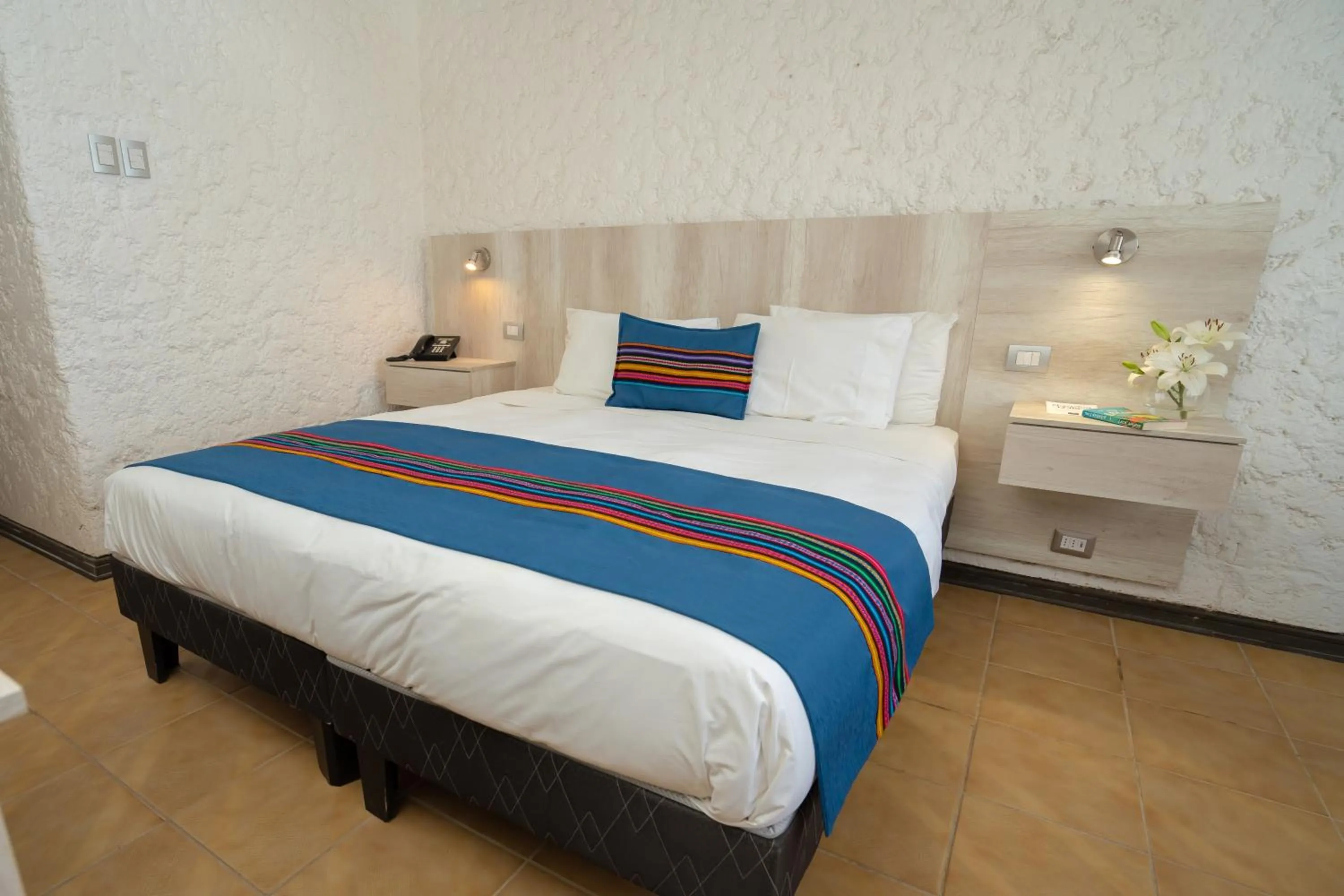 Bed in Panamericana Hotel Arica