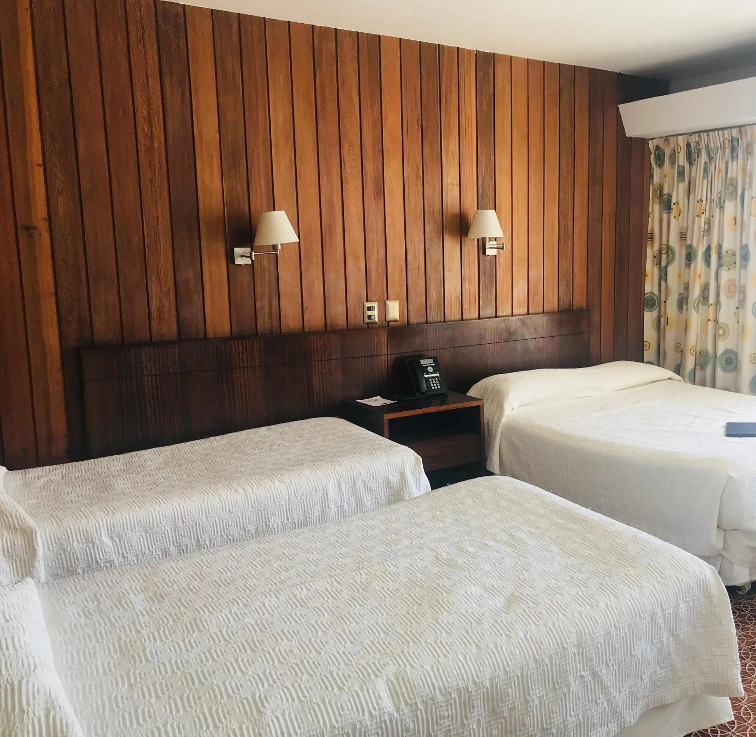 Bed in Panamericana Hotel Arica
