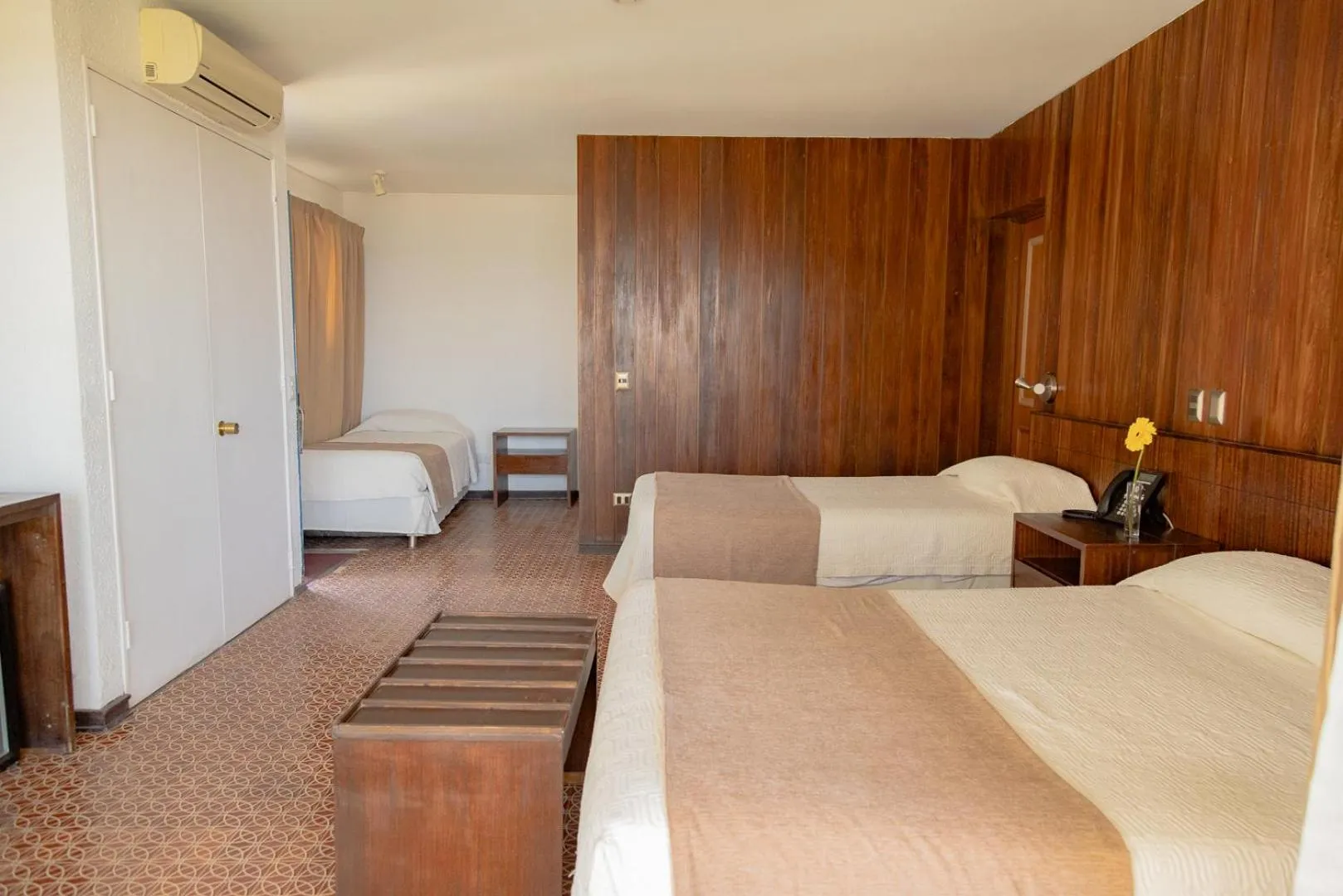 Bed in Panamericana Hotel Arica