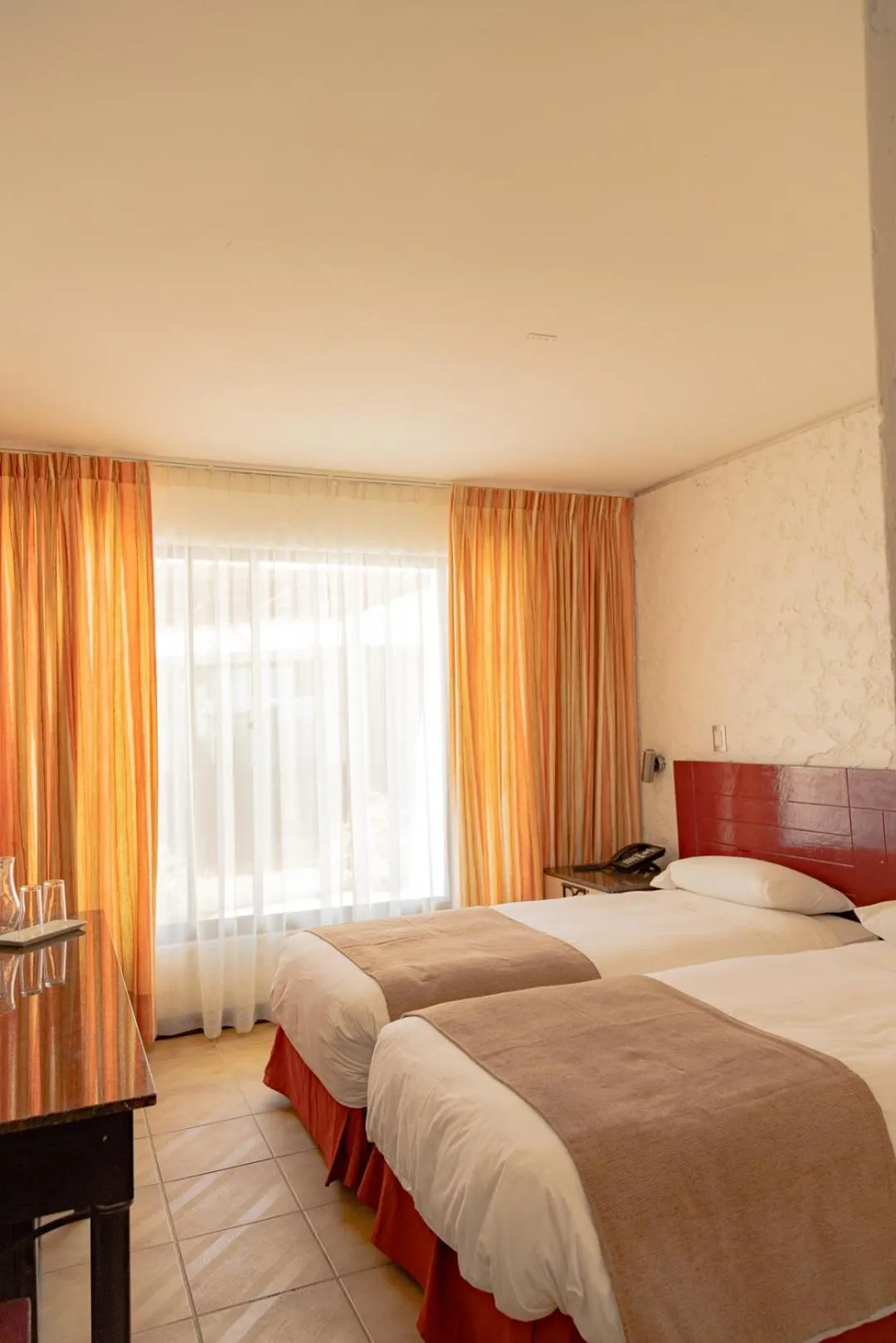 Bed in Panamericana Hotel Arica
