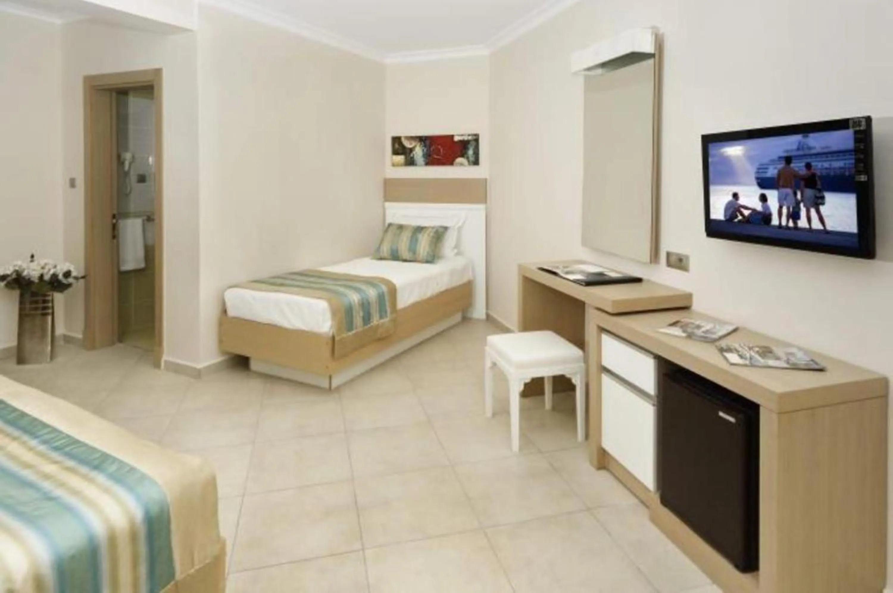 Photo of the whole room, TV/Entertainment Center in Asmin Hotel Bodrum