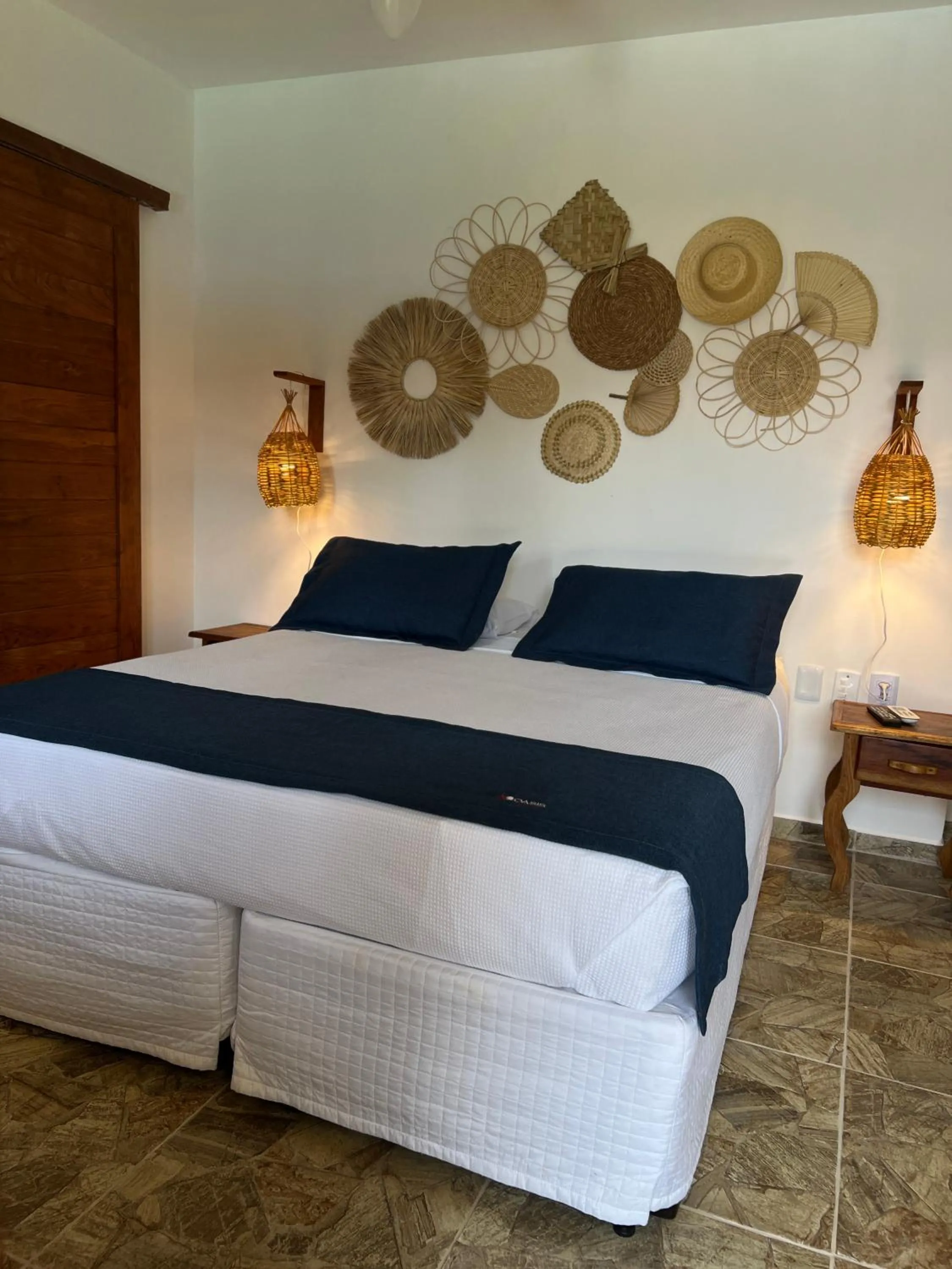 Bed in Pousada Oasis