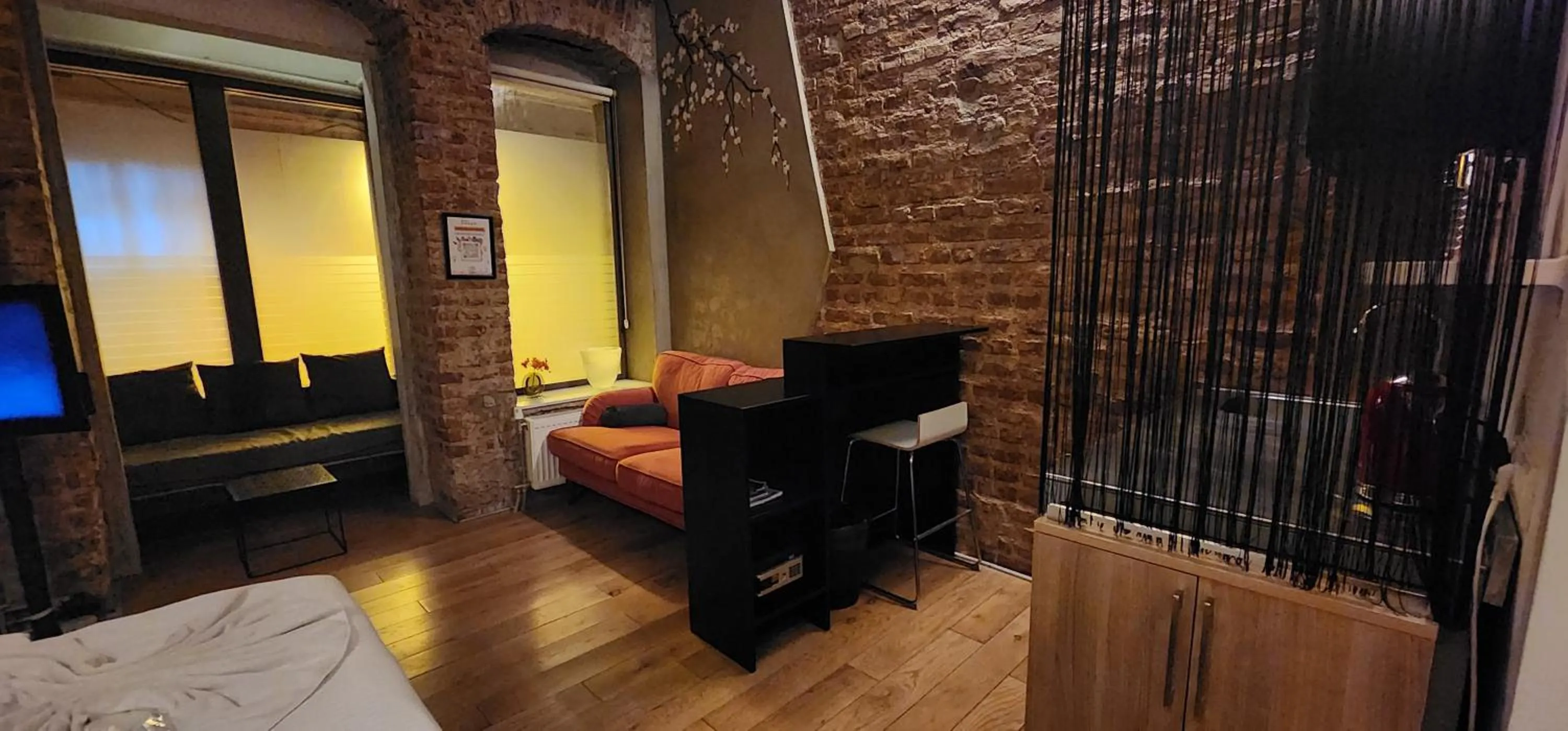 Seating area, Bed in Rooms Galata