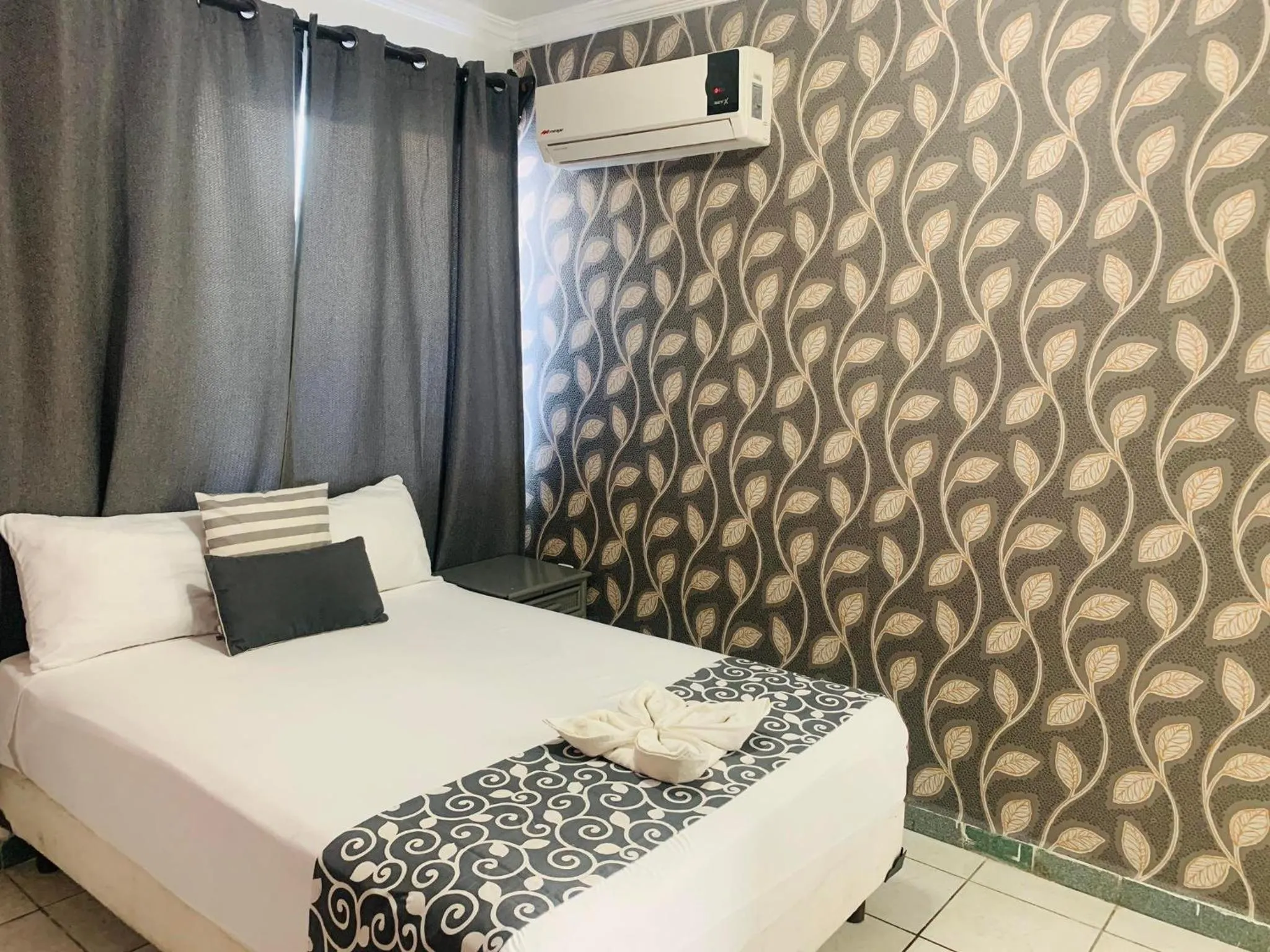 Bed in Hotel & Suites Bausan