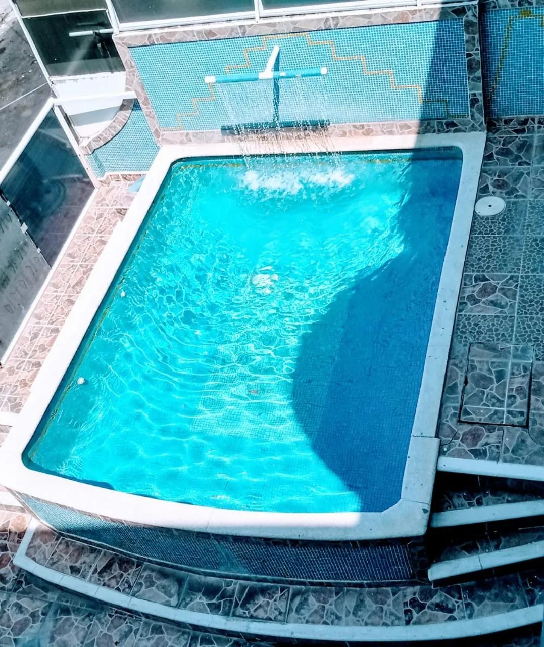 Swimming pool in Hotel & Suites Bausan