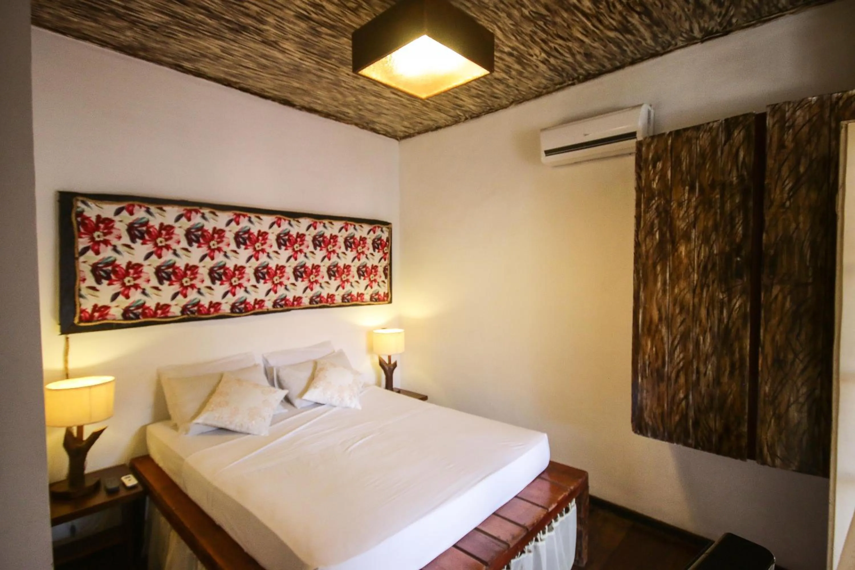 Bed in Pousada Portas da Amazônia