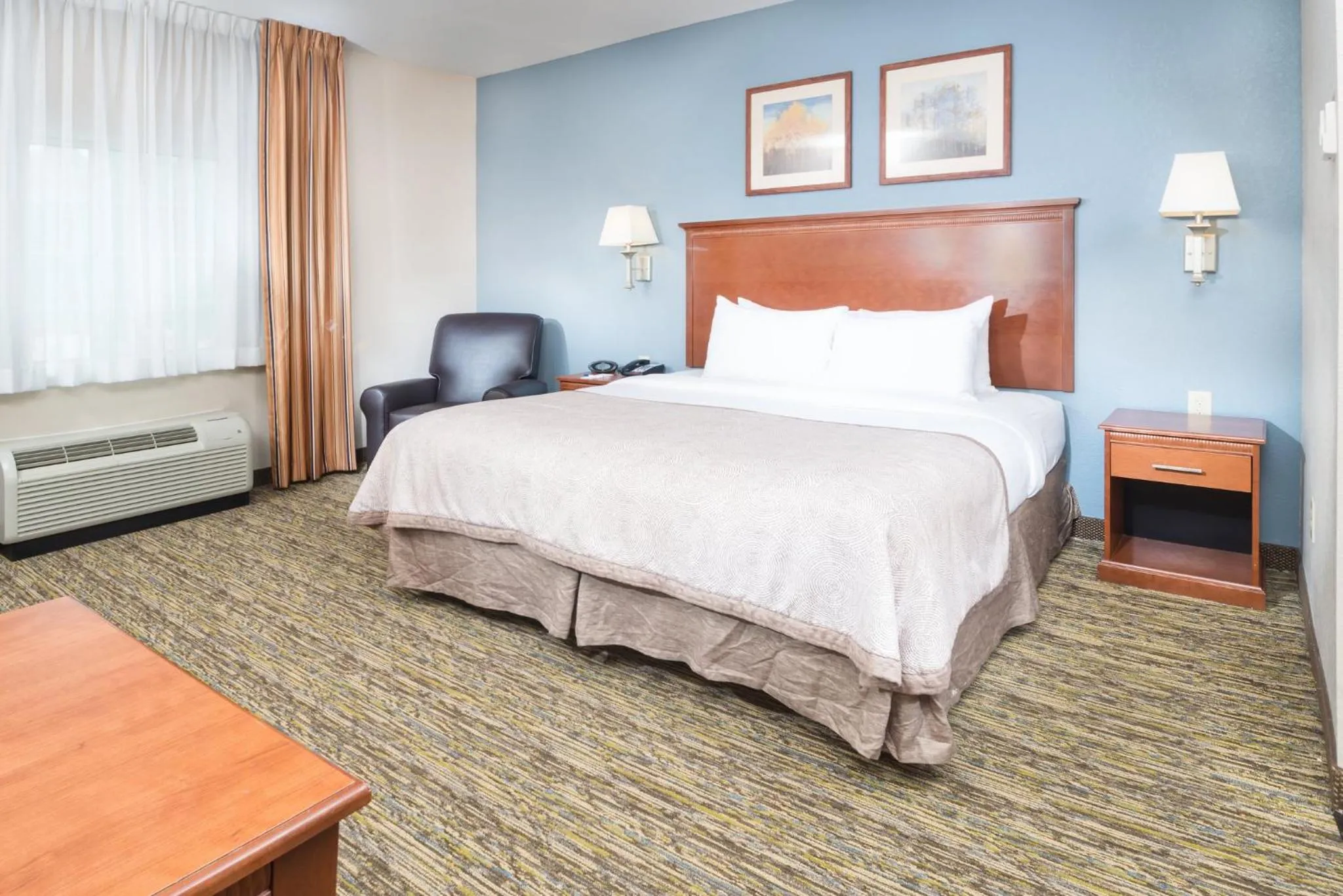 Photo of the whole room, Bed in Candlewood Suites Wake Forest-Raleigh Area by IHG