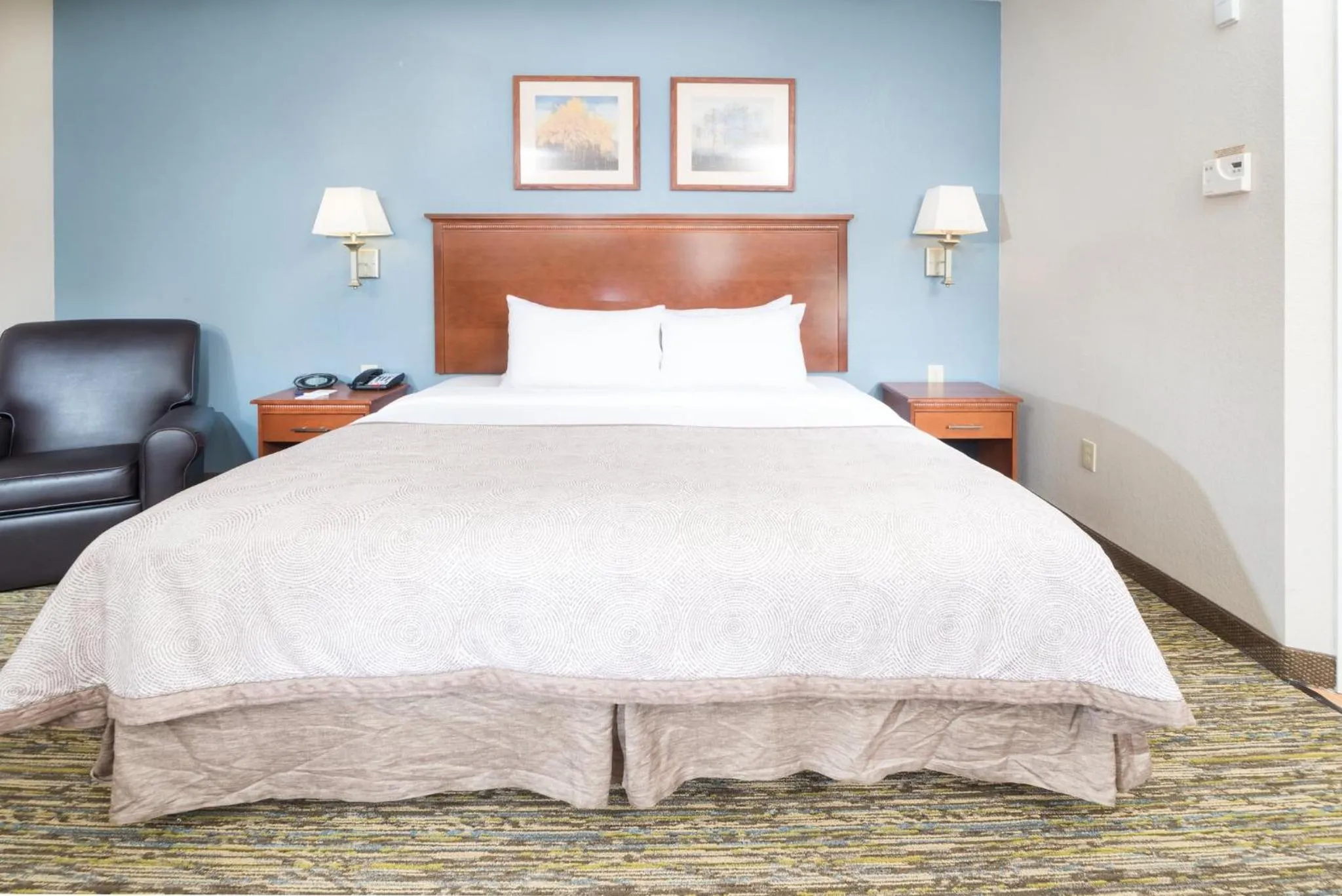 Photo of the whole room, Bed in Candlewood Suites Wake Forest-Raleigh Area by IHG
