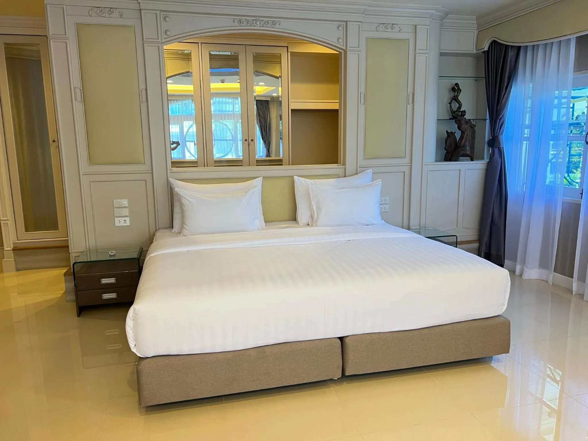 Bed in V20 Boutique Jacuzzi Hotel