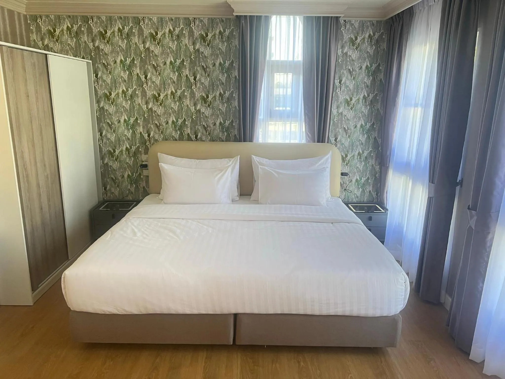 Bed in V20 Boutique Jacuzzi Hotel