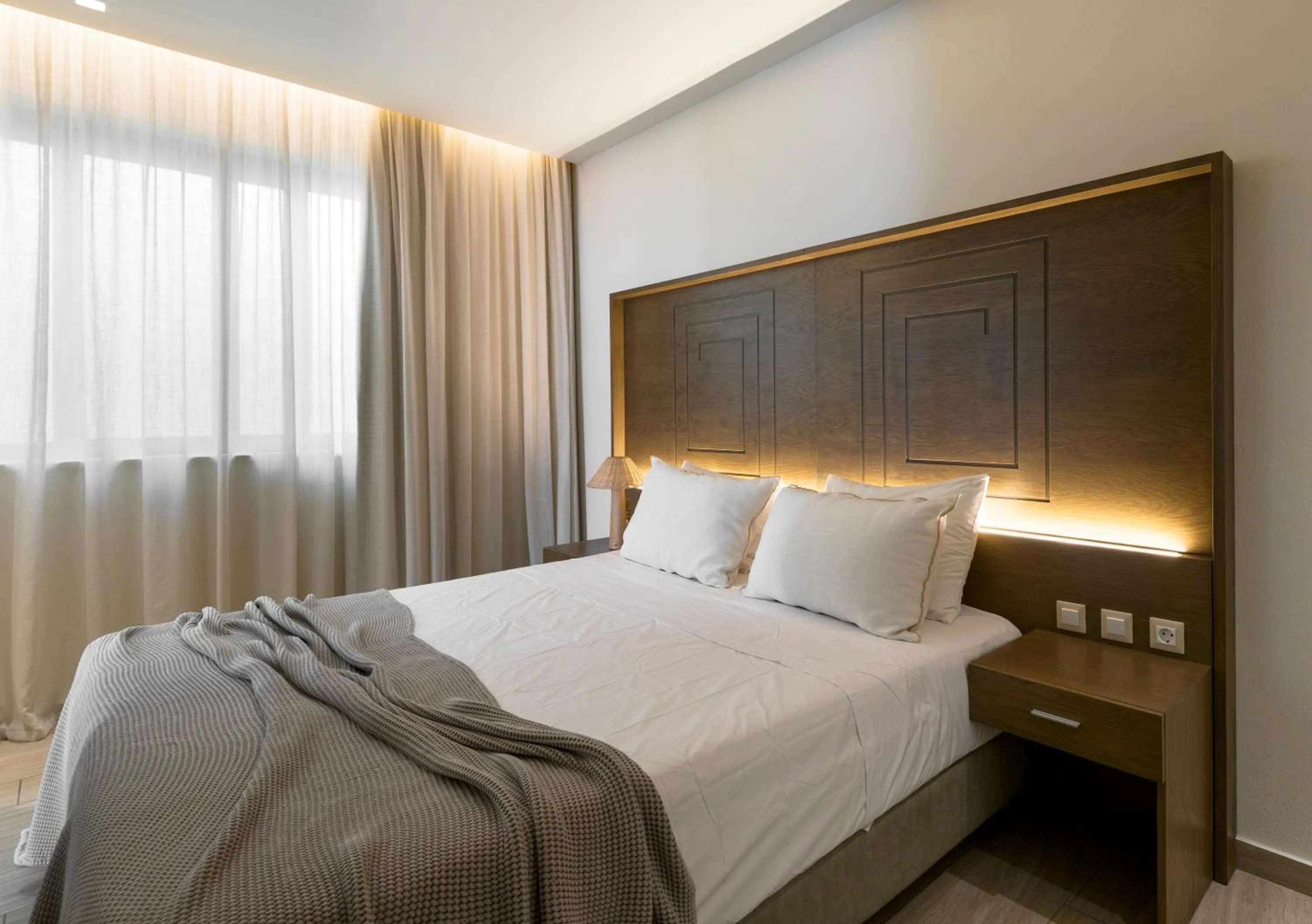 Bed in Prima Vista Beachfront Boutique Hotel