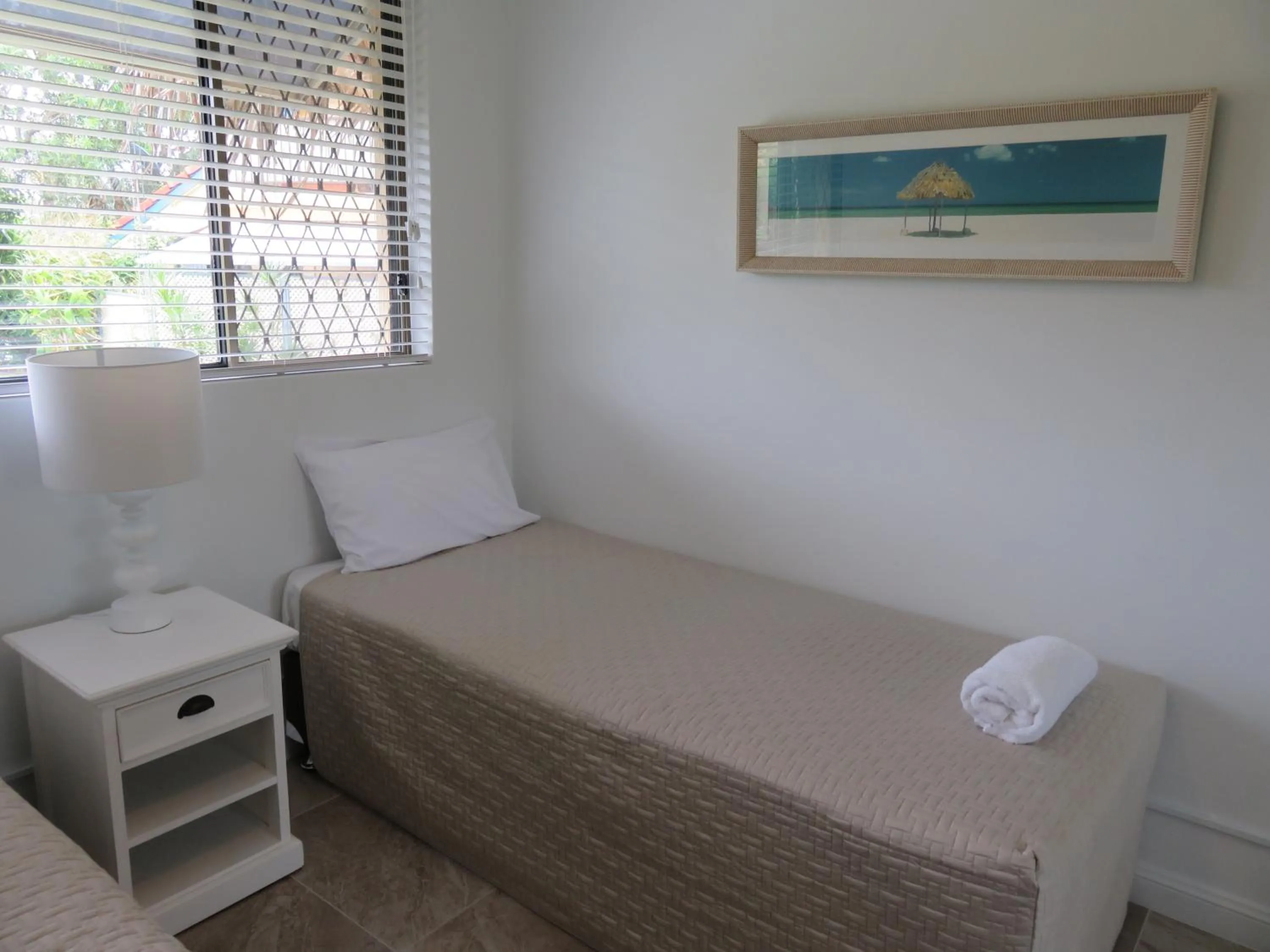 Bed in Sunseeker Holiday Apartments