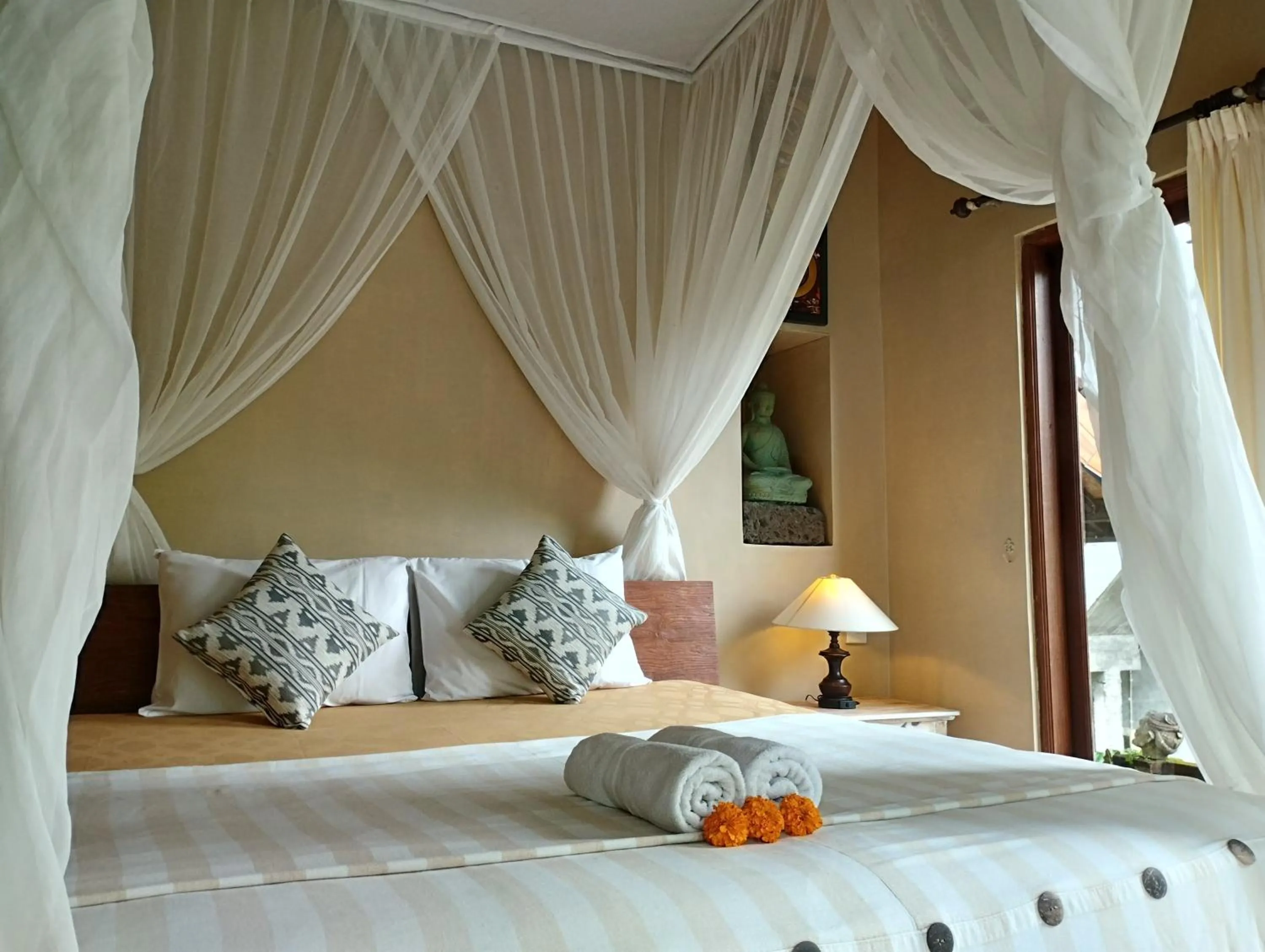 Bed in Umah Ubud Guest House