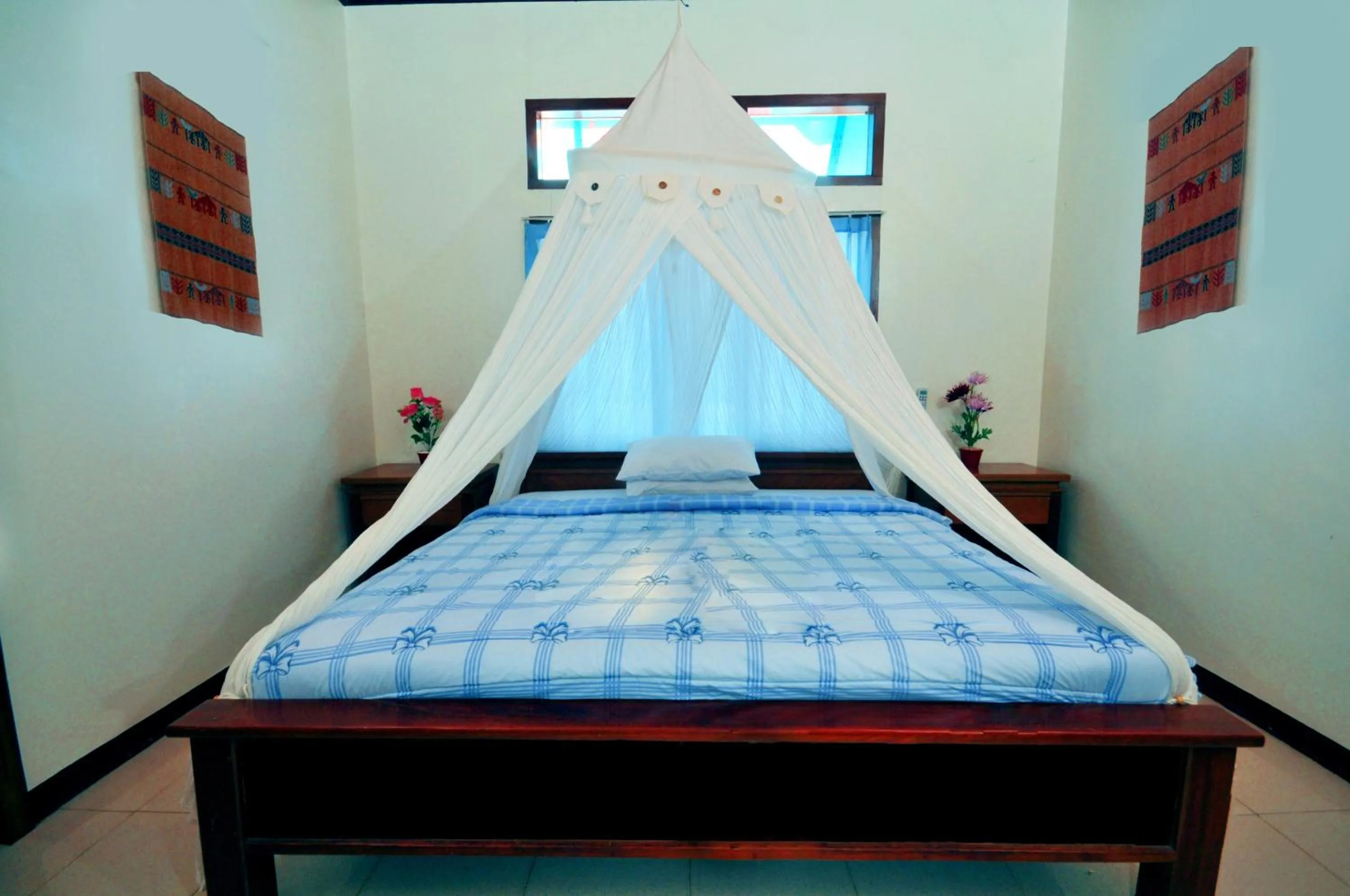 Bed in Aman Gati Hotel Lakey