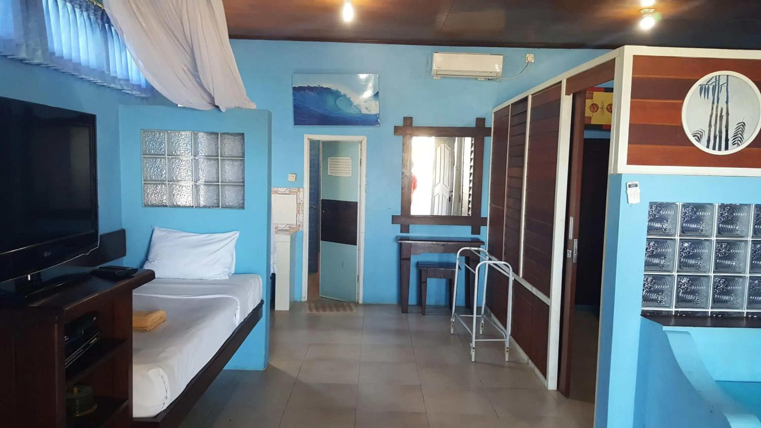 Bed in Aman Gati Hotel Lakey