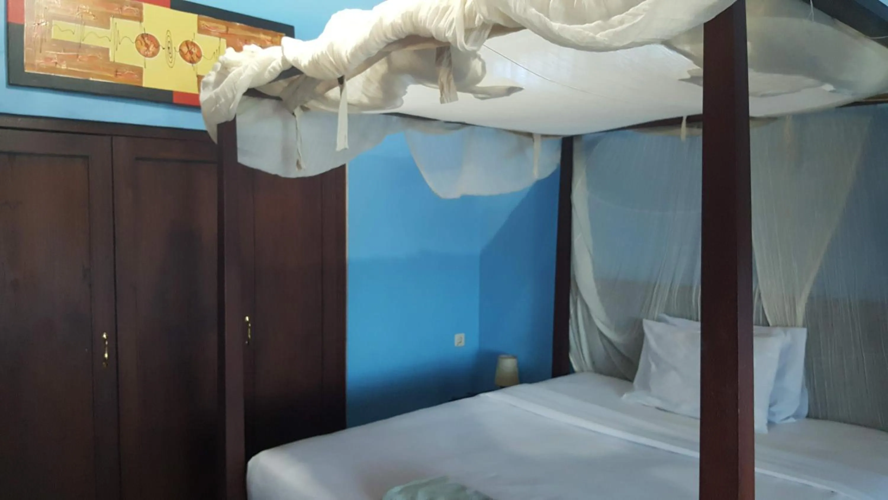 Bed in Aman Gati Hotel Lakey