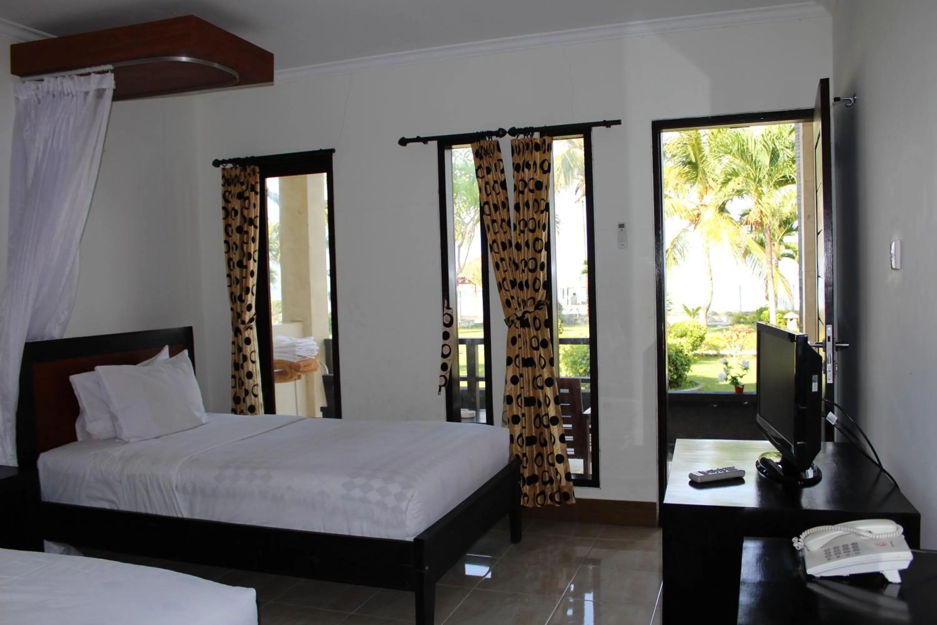 Bed in Aman Gati Hotel Lakey