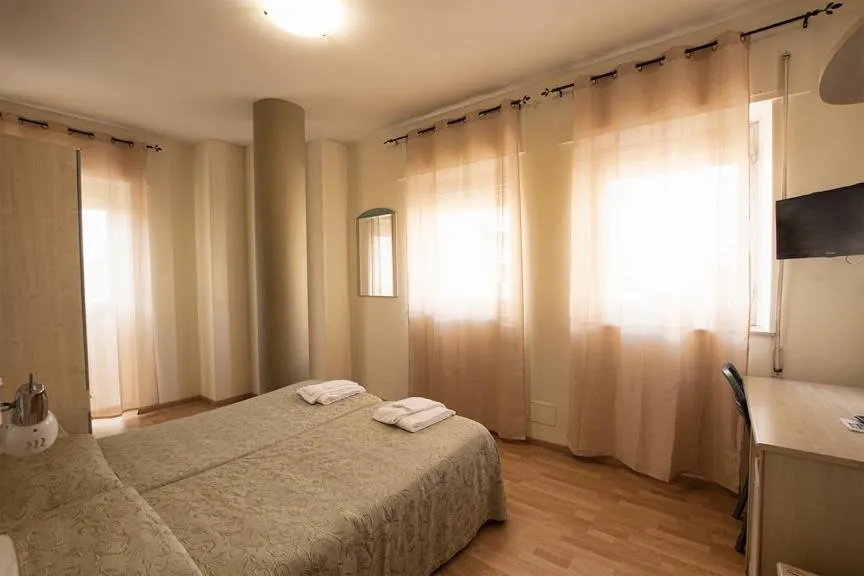 Bed in Hotel Scacciapensieri