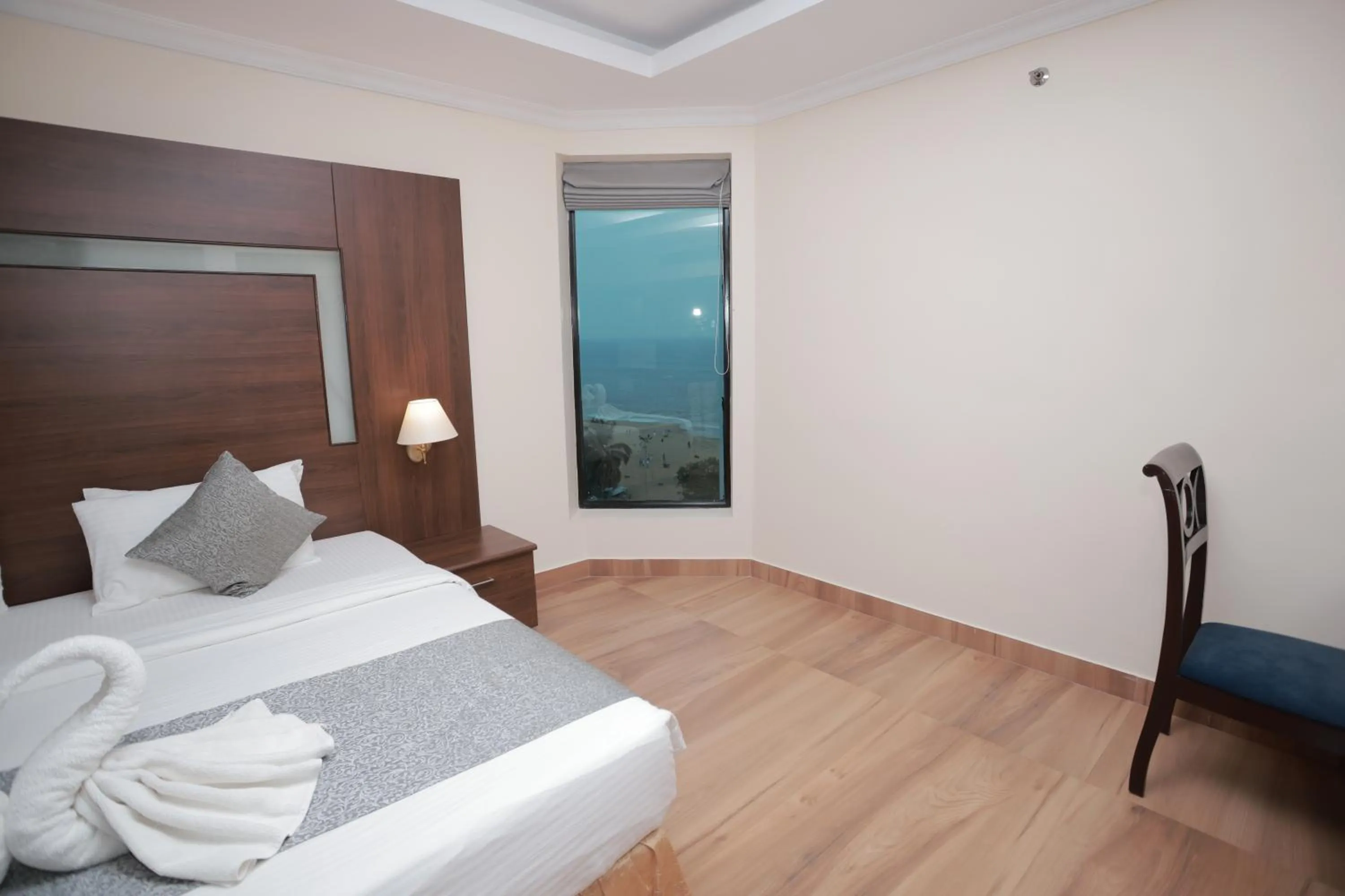 Bed in The Quilon Beach Hotel and Convention Center