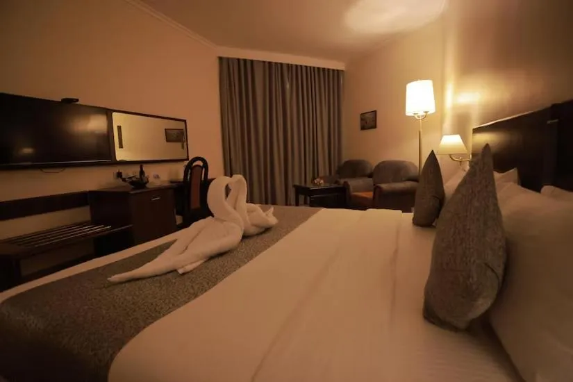 TV and multimedia, Bed in The Quilon Beach Hotel and Convention Center