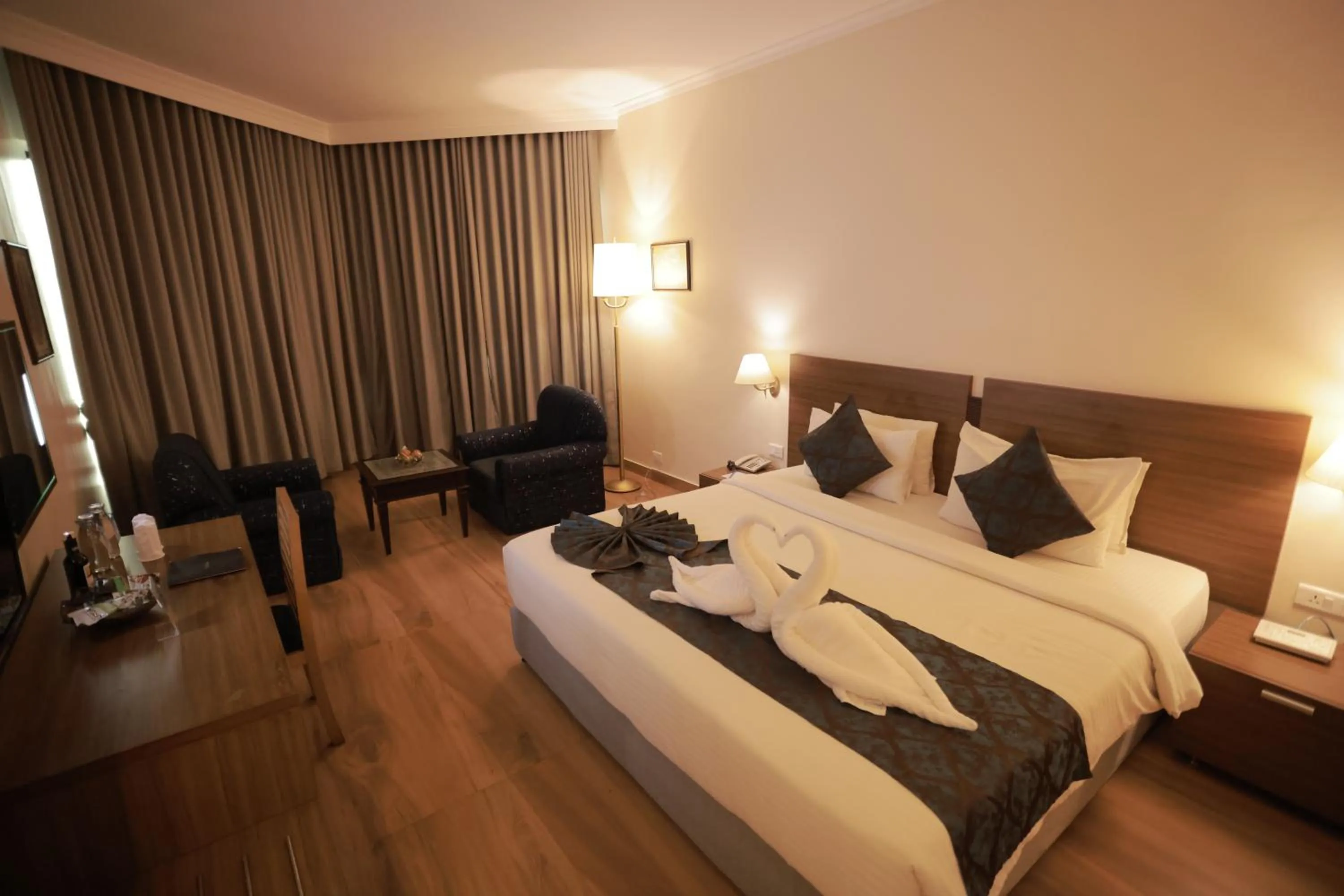 Bed in The Quilon Beach Hotel and Convention Center