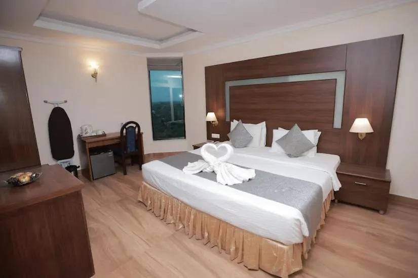 Bed in The Quilon Beach Hotel and Convention Center