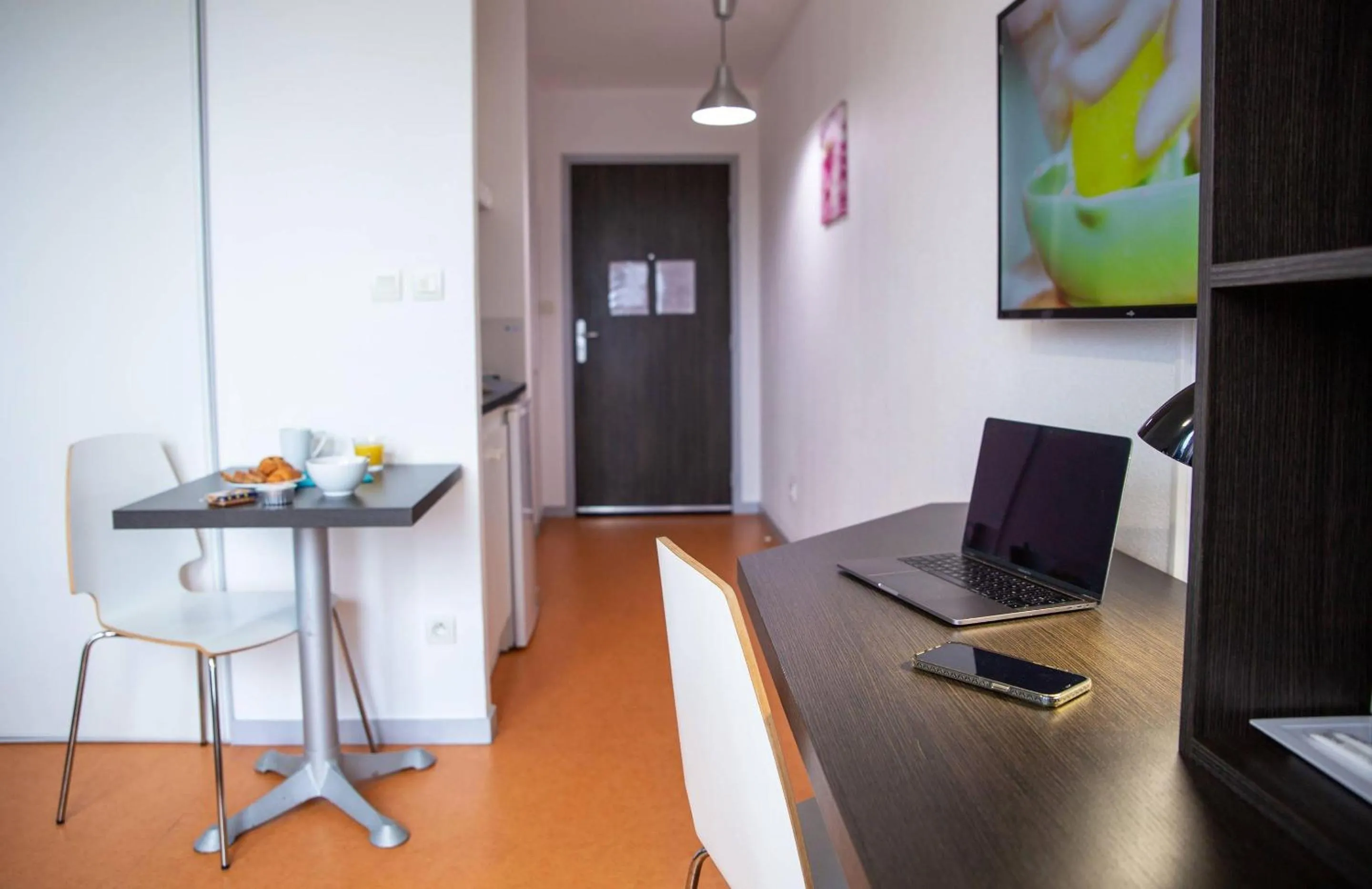 Dining area in Comfort Aparthotel Besancon Hauts du Chazal