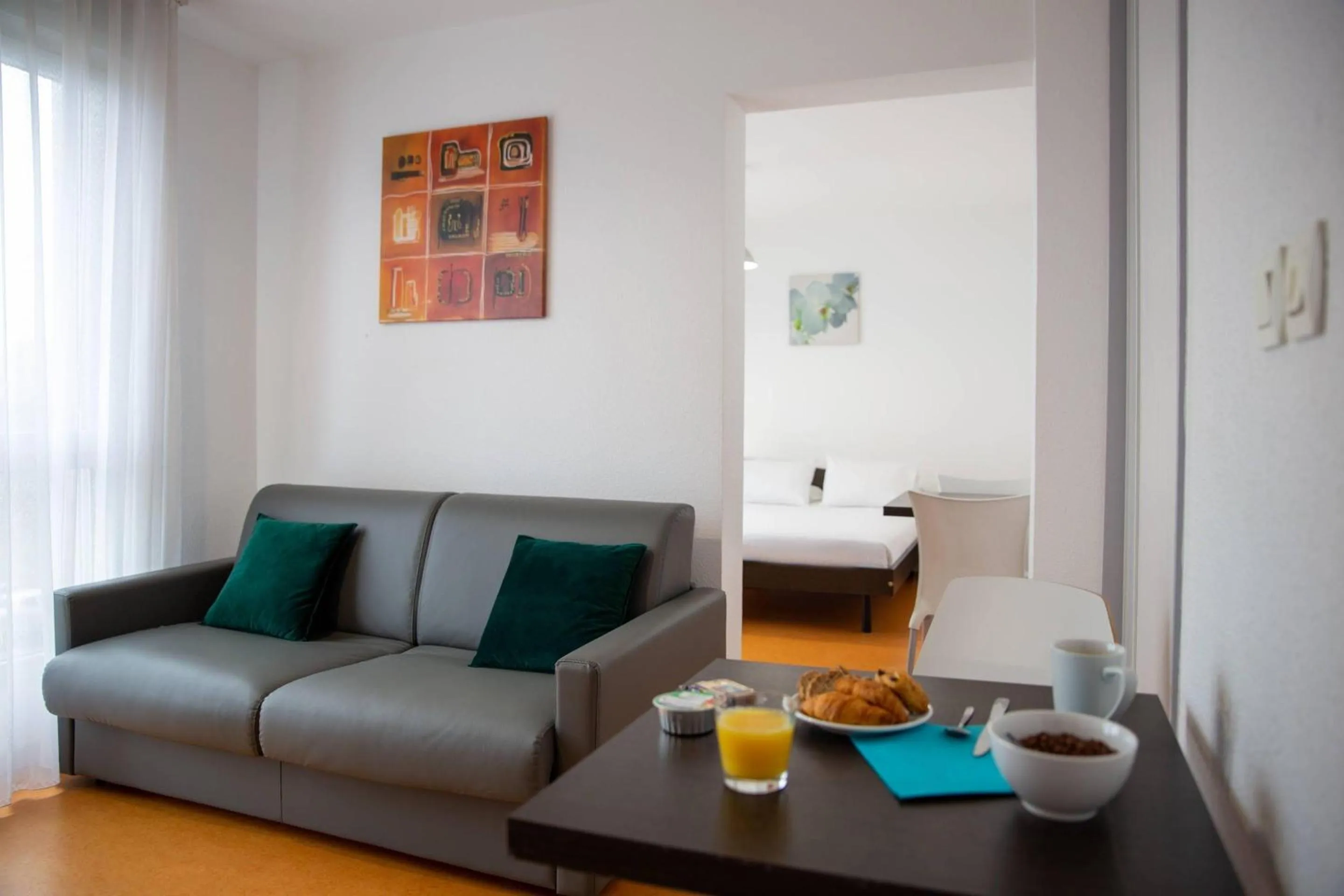 Seating area in Comfort Aparthotel Besancon Hauts du Chazal