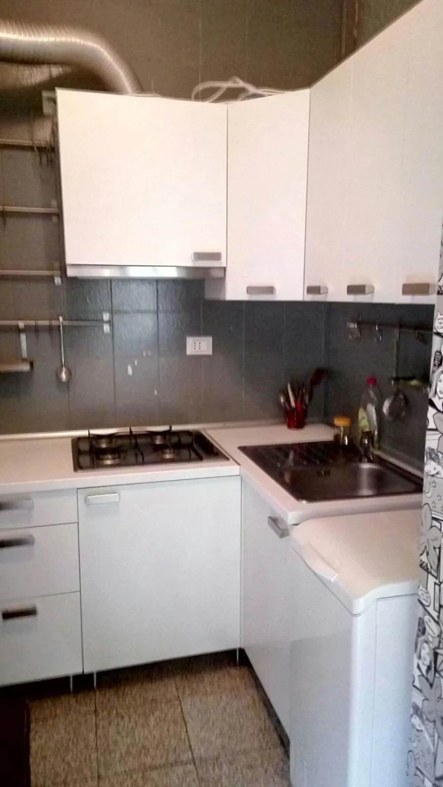 Kitchen or kitchenette in La casa del corso