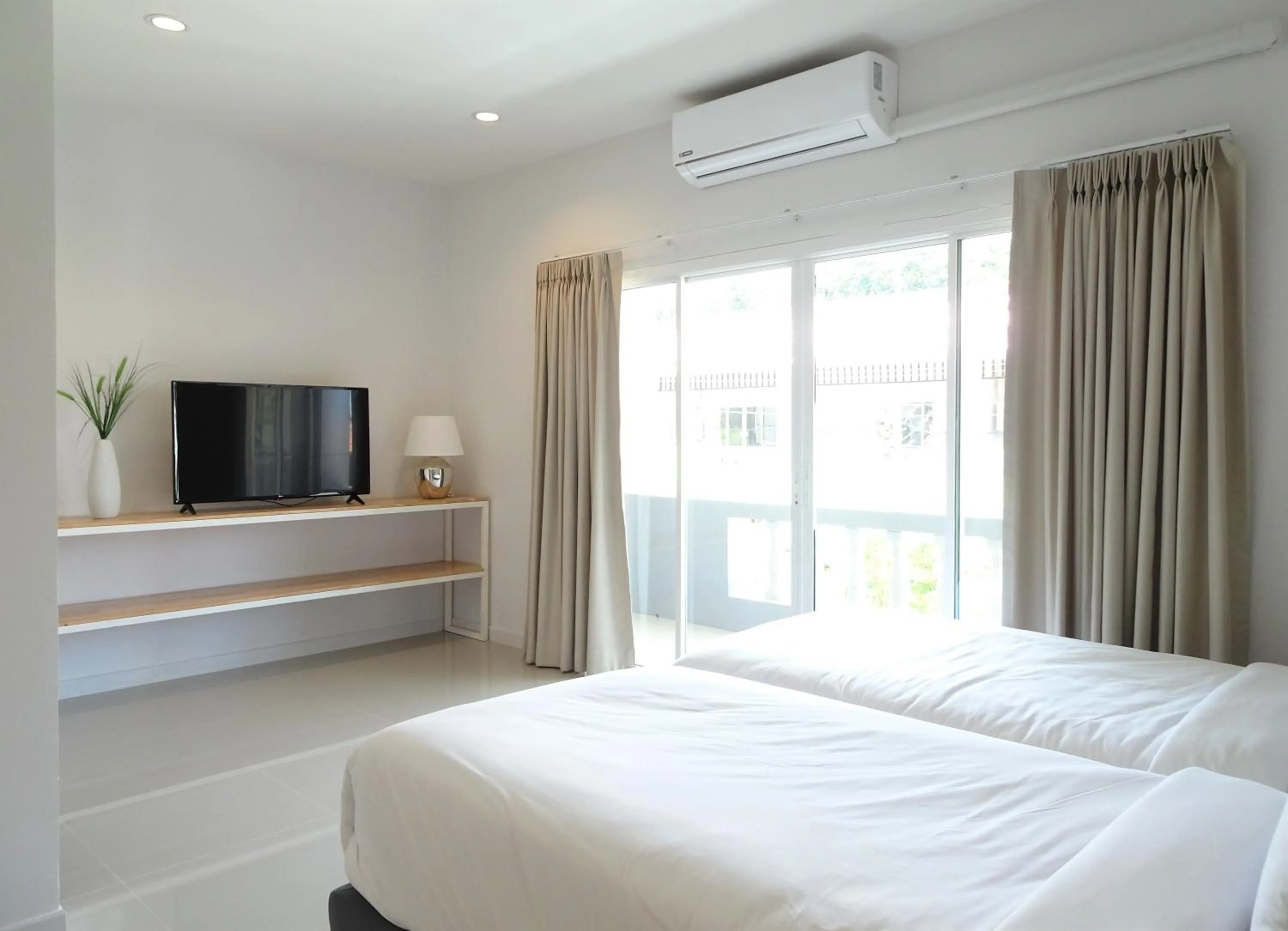 Bed in Isara Khao Lak