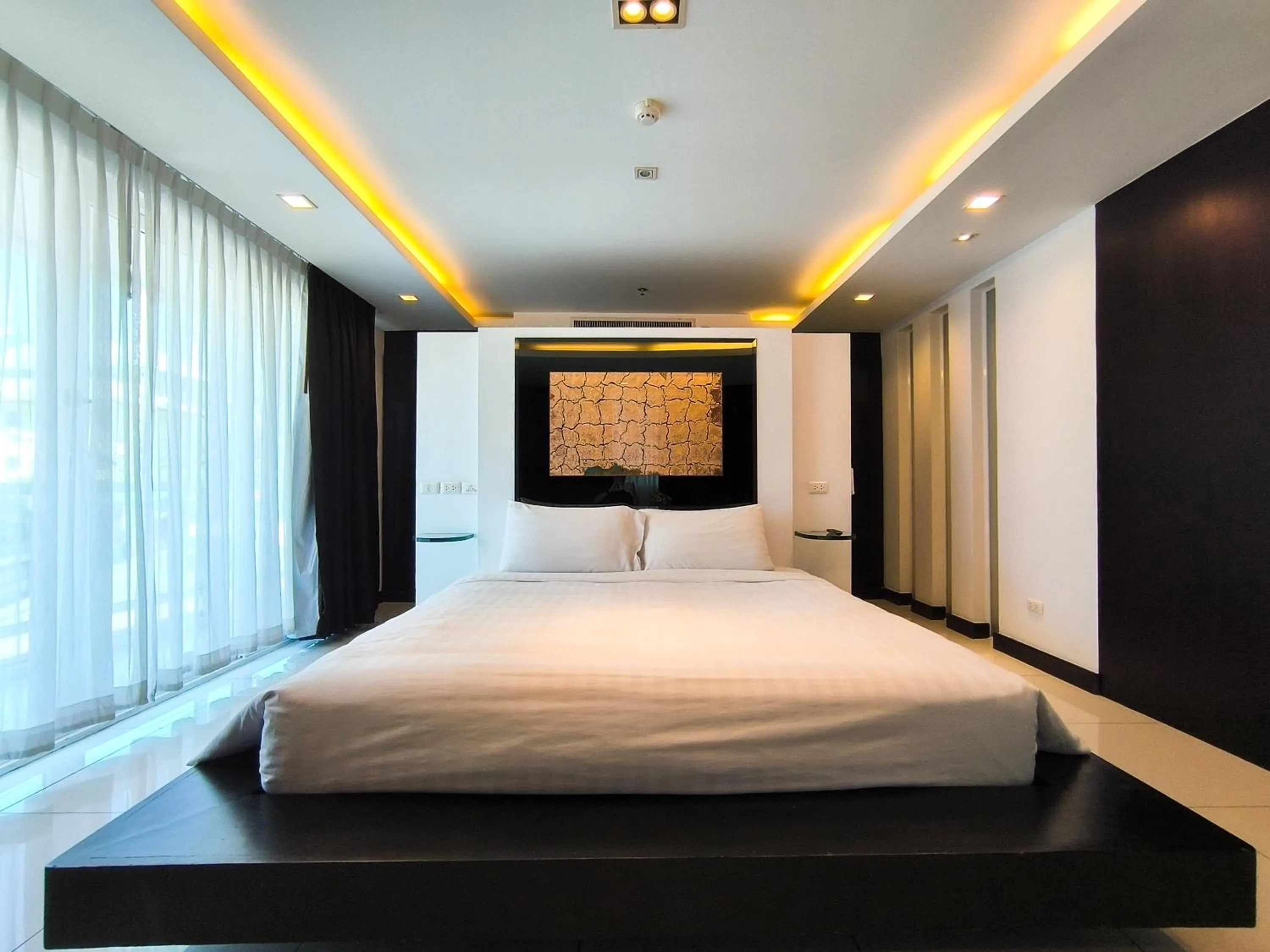 Bed in Nova Suites Pattaya by Compass Hospitality