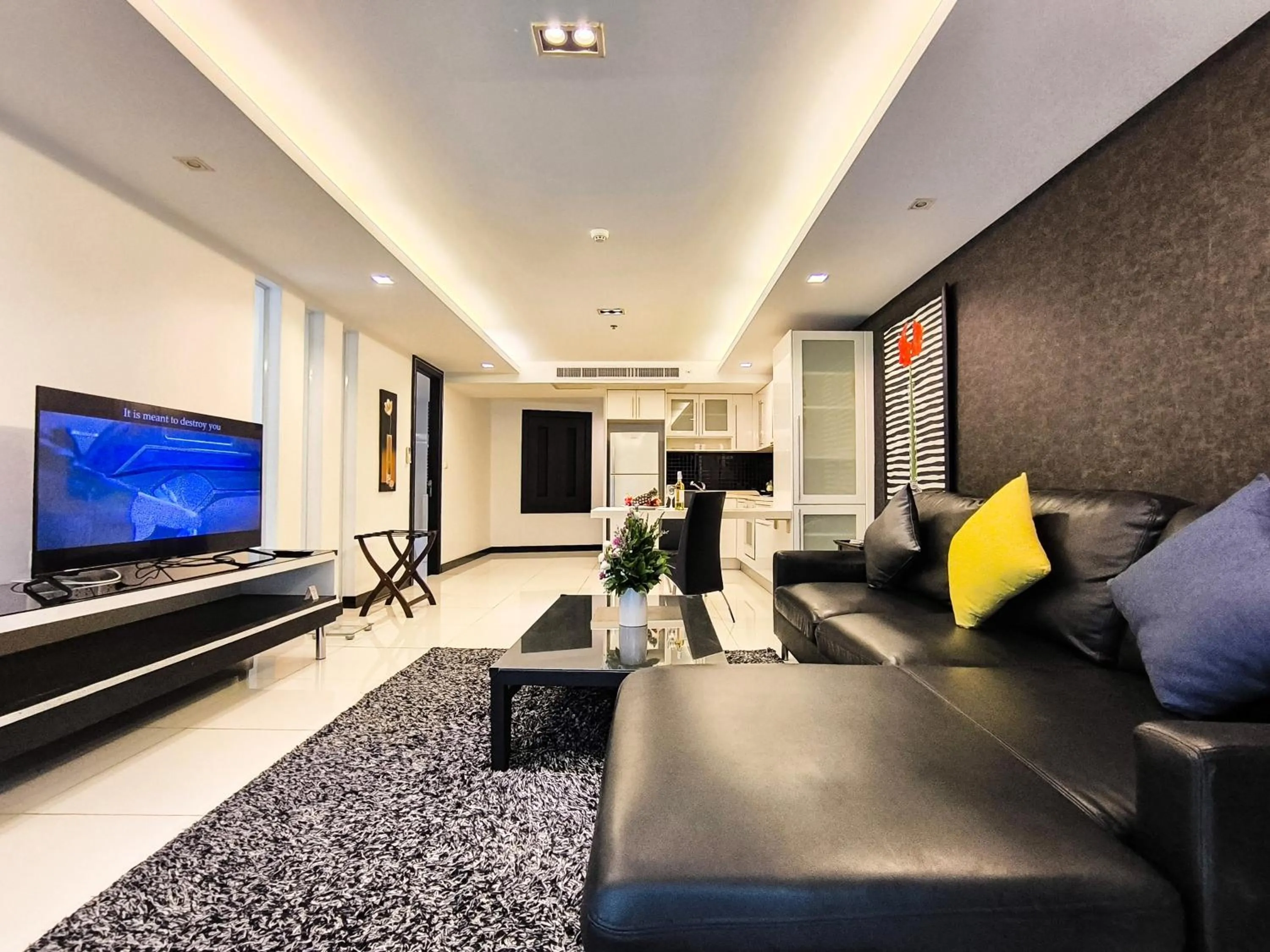Living room in Nova Suites Pattaya by Compass Hospitality