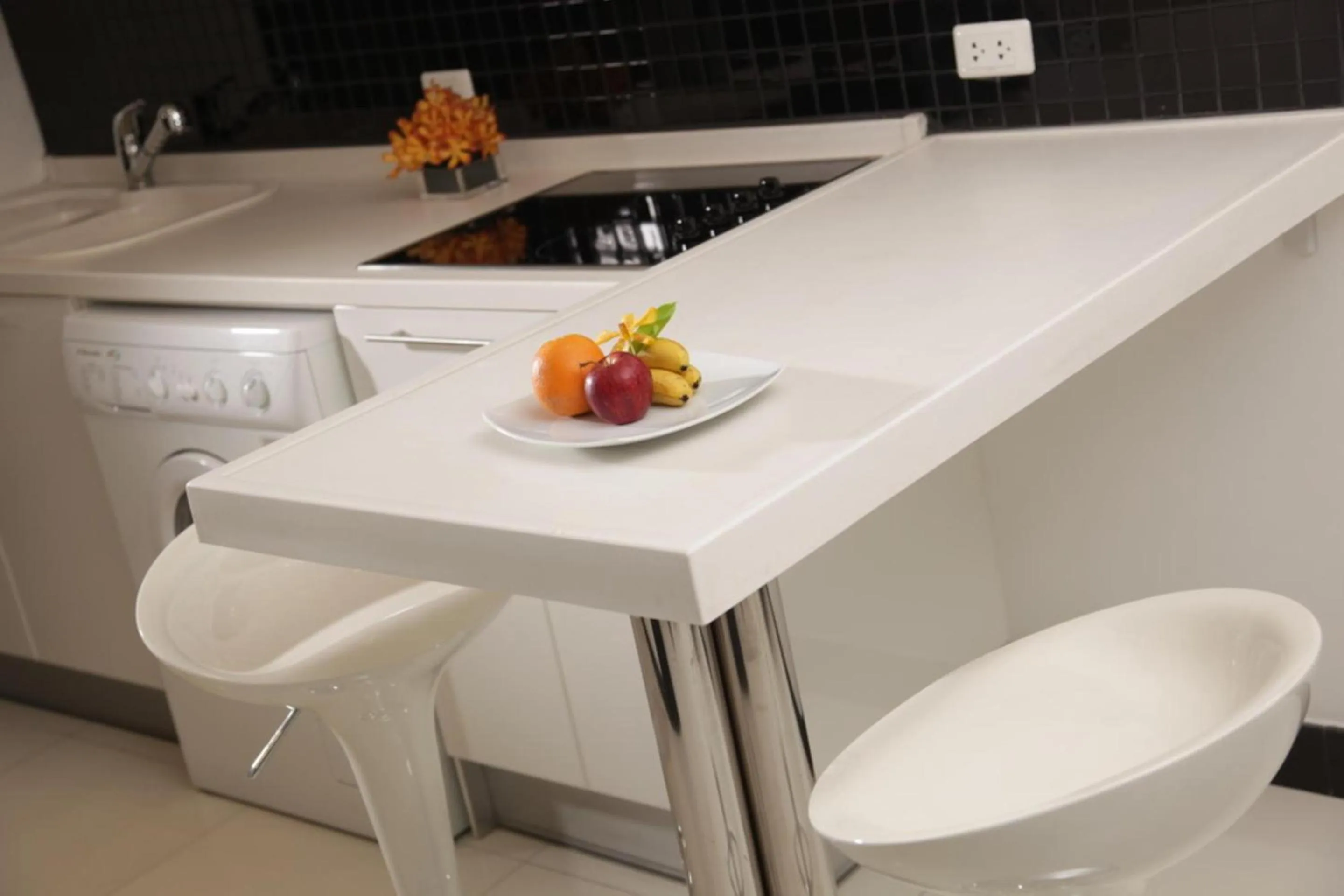 Kitchen or kitchenette in Nova Suites Pattaya by Compass Hospitality