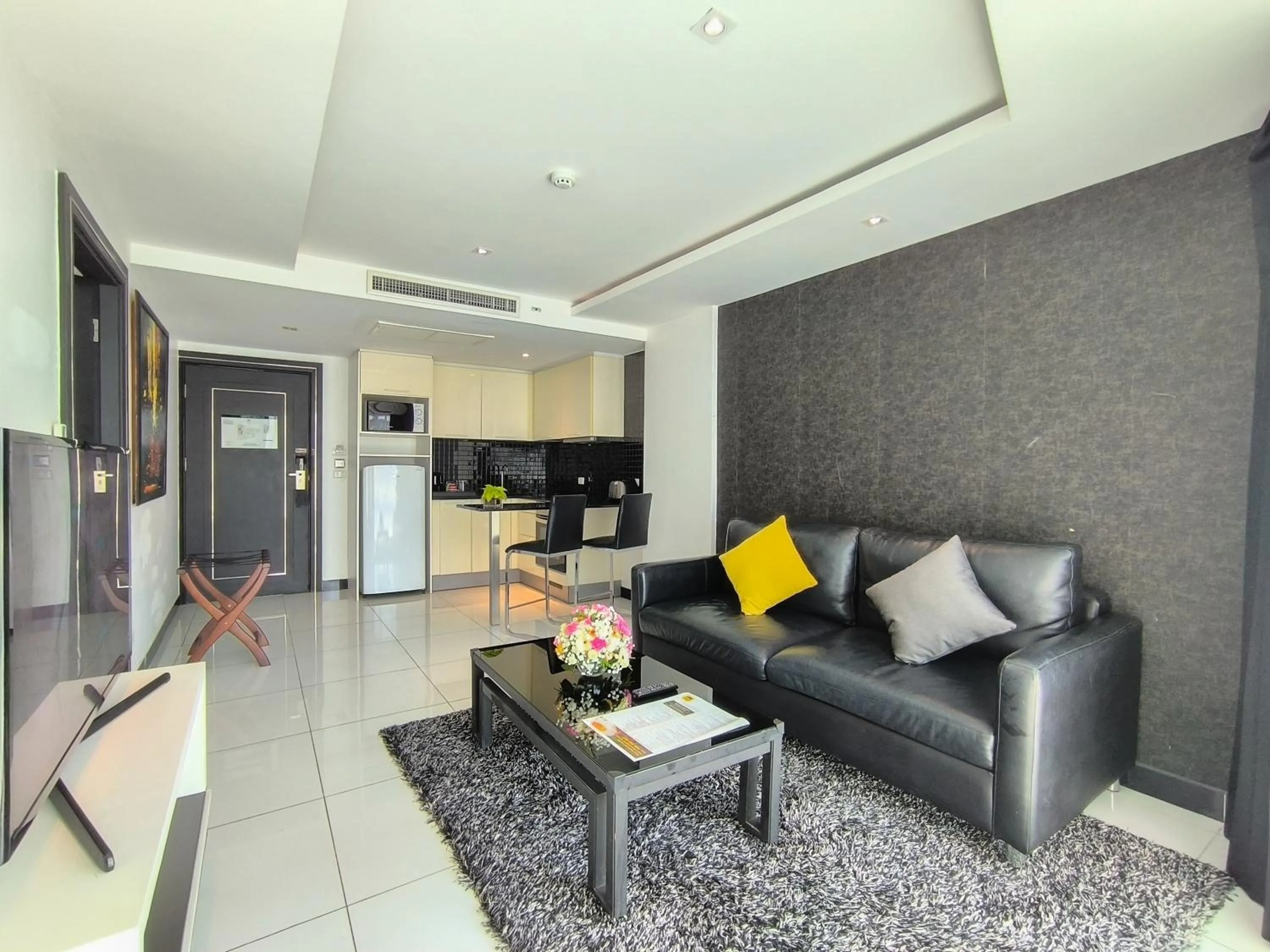 Kitchen or kitchenette in Nova Suites Pattaya by Compass Hospitality