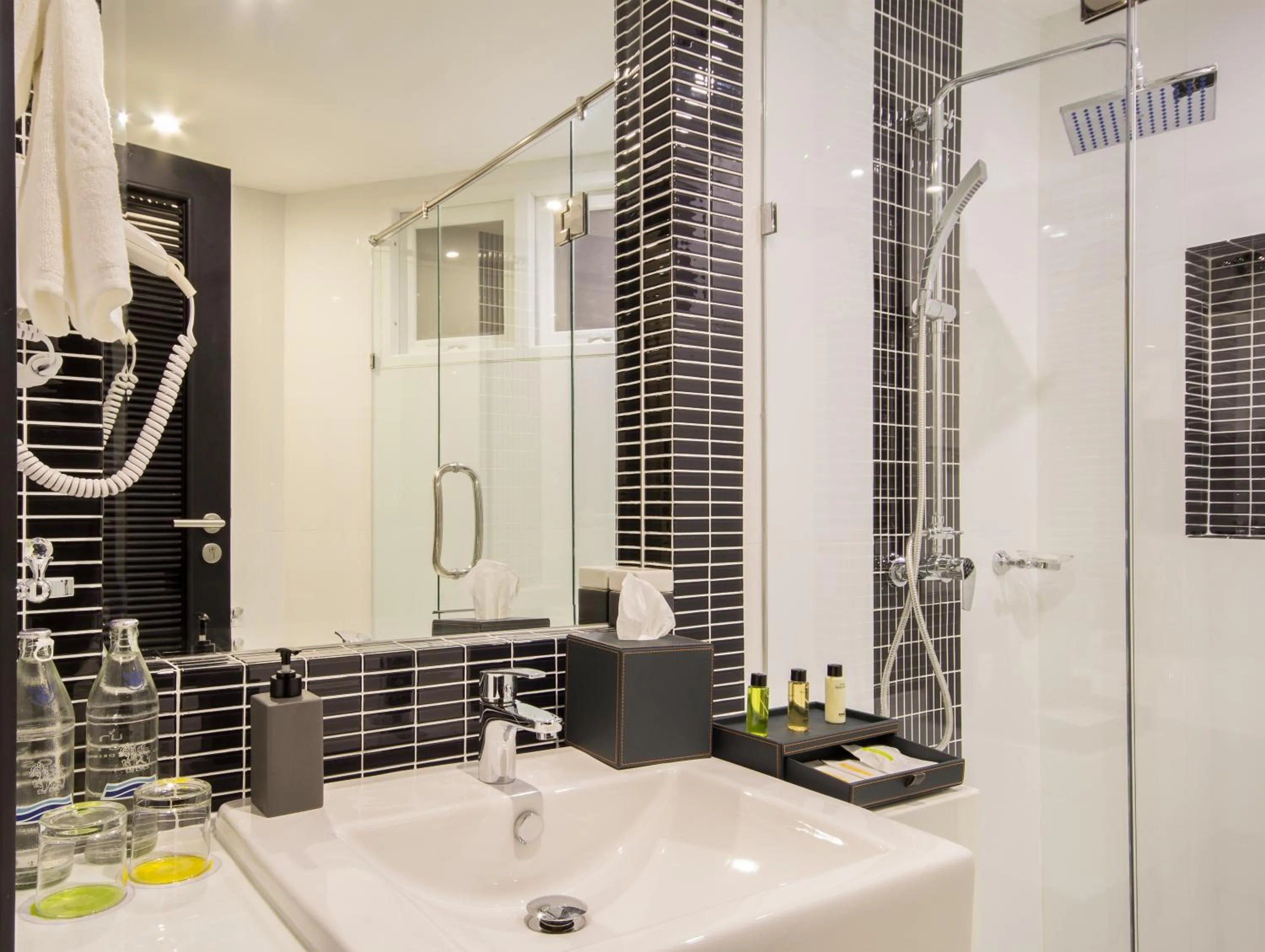 Shower in Nova Suites Pattaya by Compass Hospitality