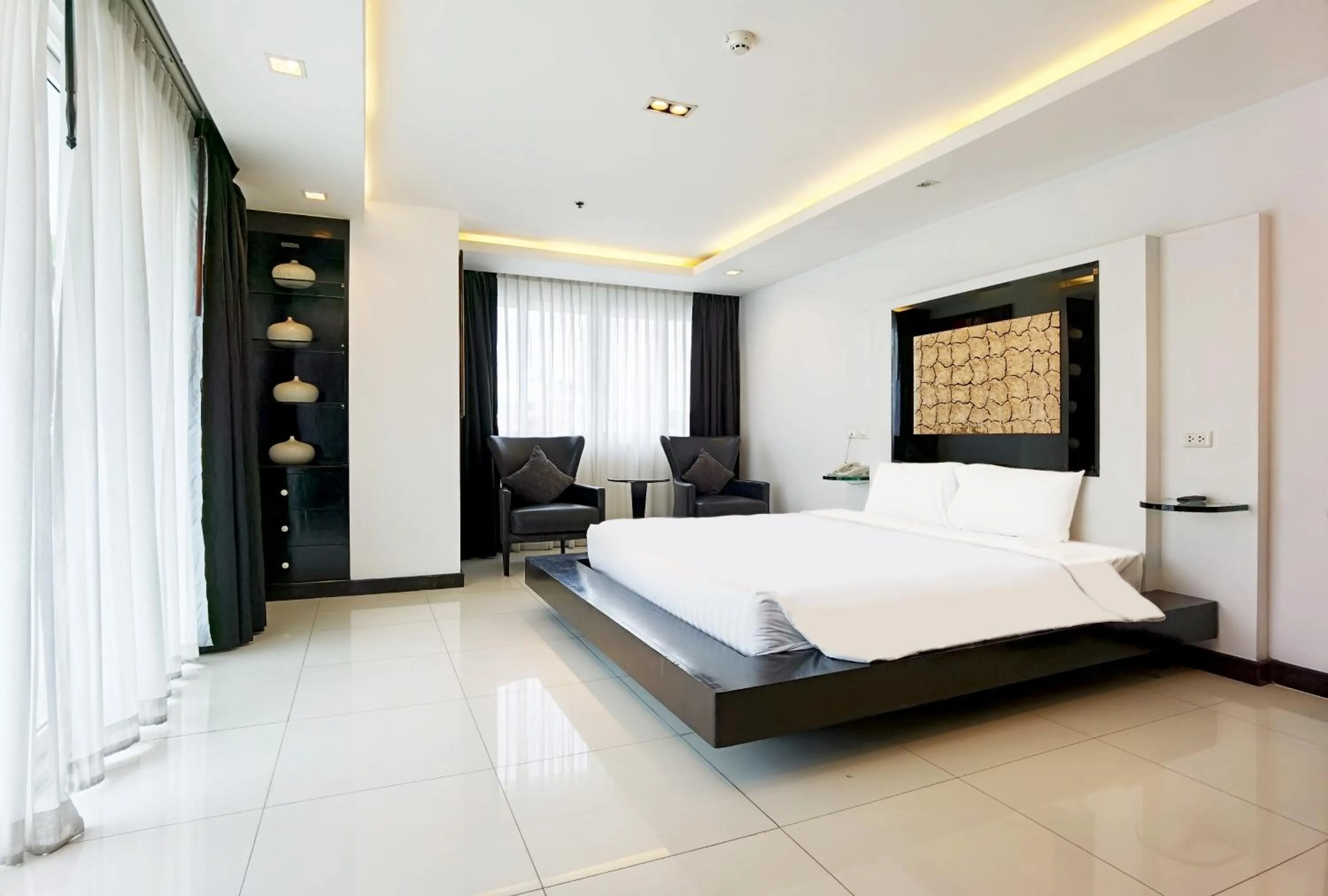 Bed in Nova Suites Pattaya by Compass Hospitality