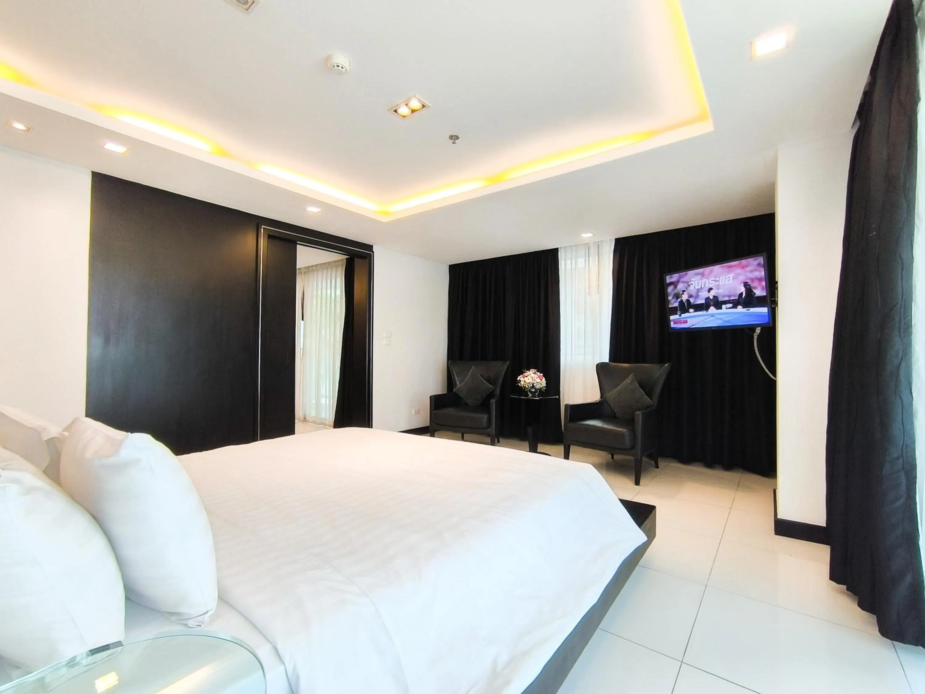 Bed in Nova Suites Pattaya by Compass Hospitality