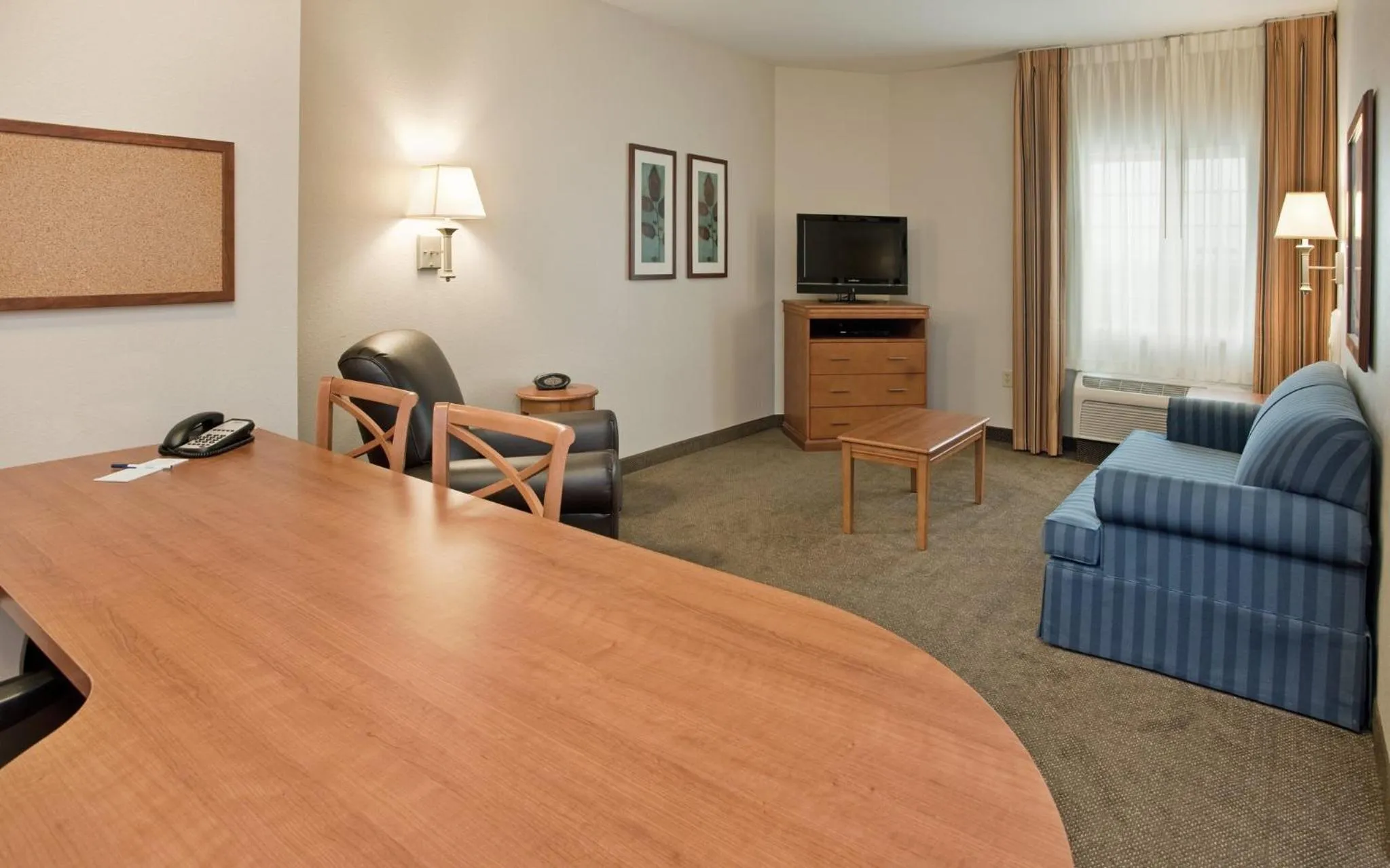 Bedroom in Candlewood Suites Kansas City Northeast by IHG