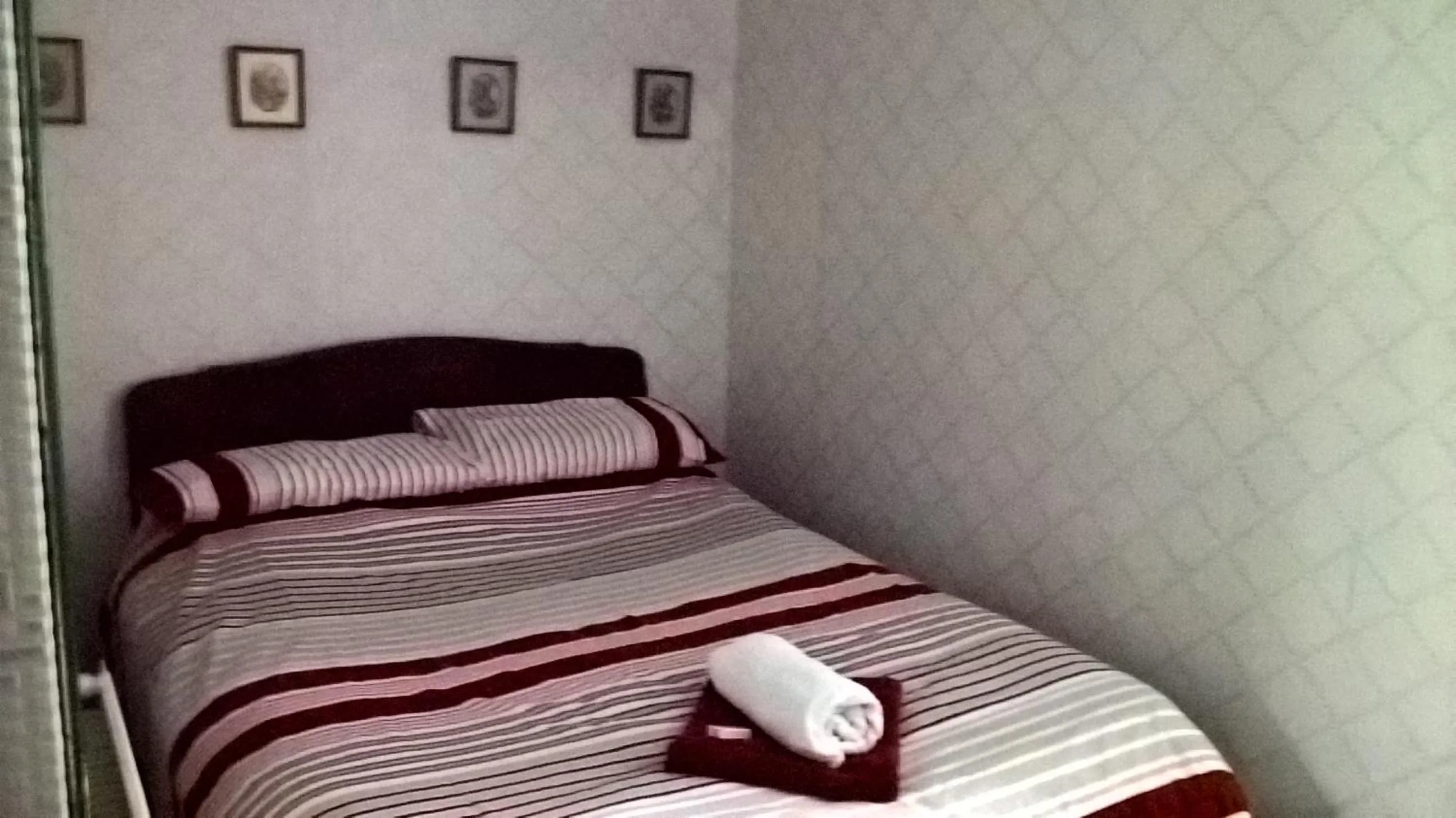 Bed in Rhymney House hotel