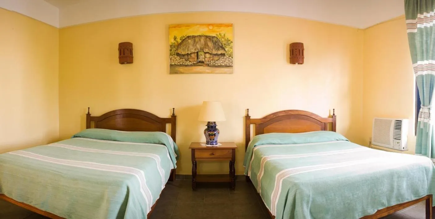 Bed in Hotel Real Del Mayab