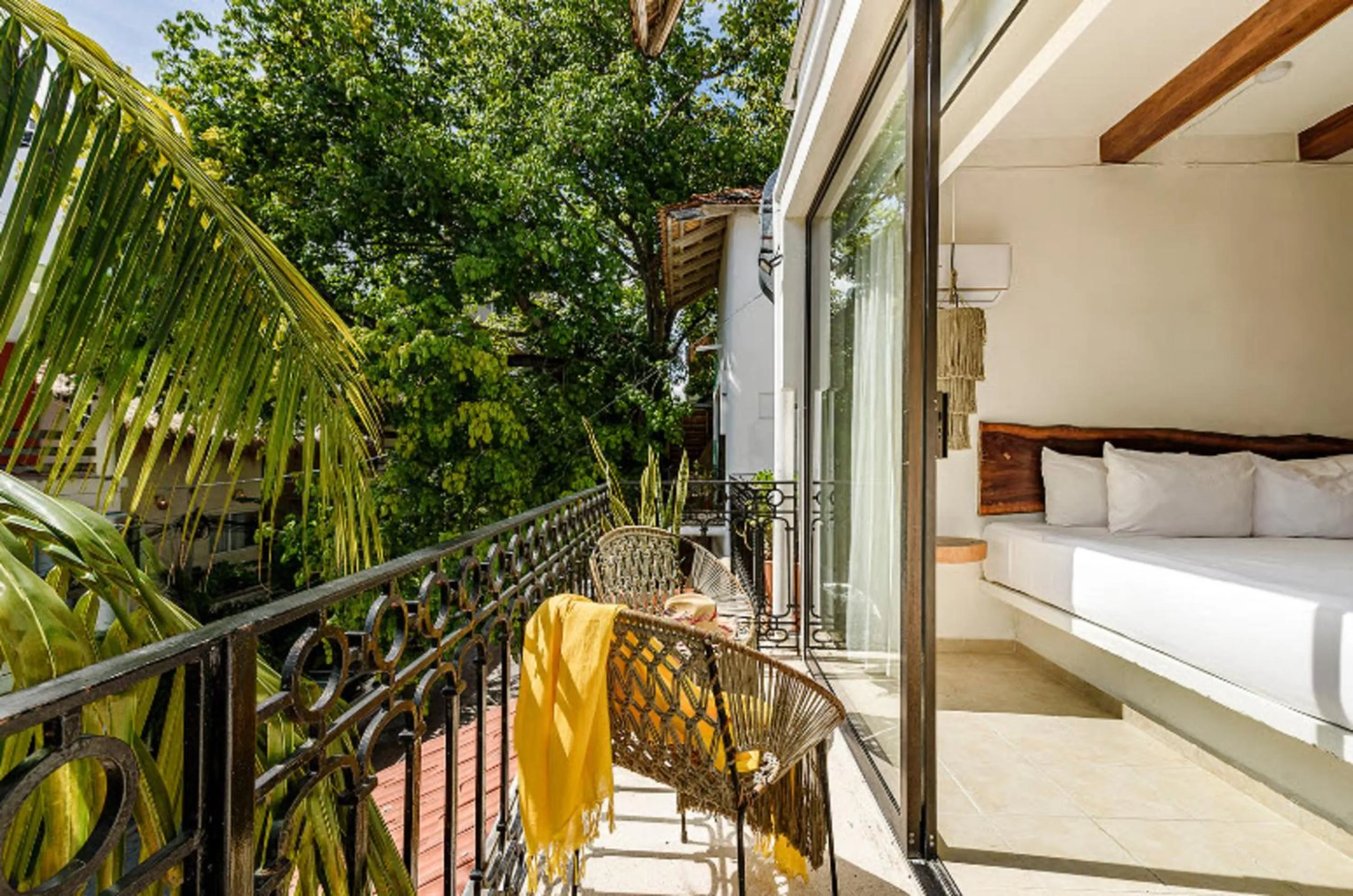 View (from property/room), Bed in Caribbean Paradise Hotel & Spa - 5th Avenue