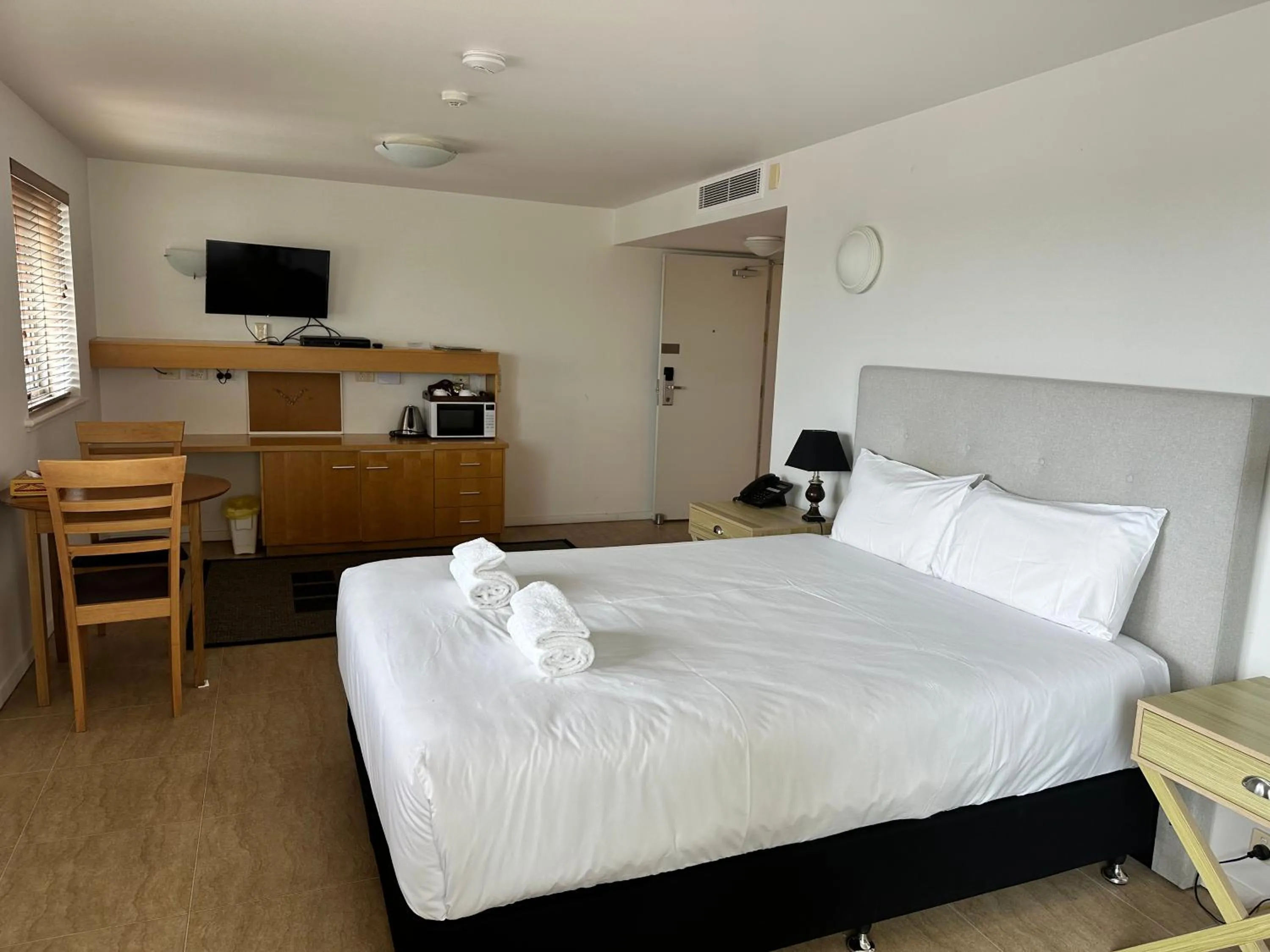 Bed in Riverside Holiday Apartments