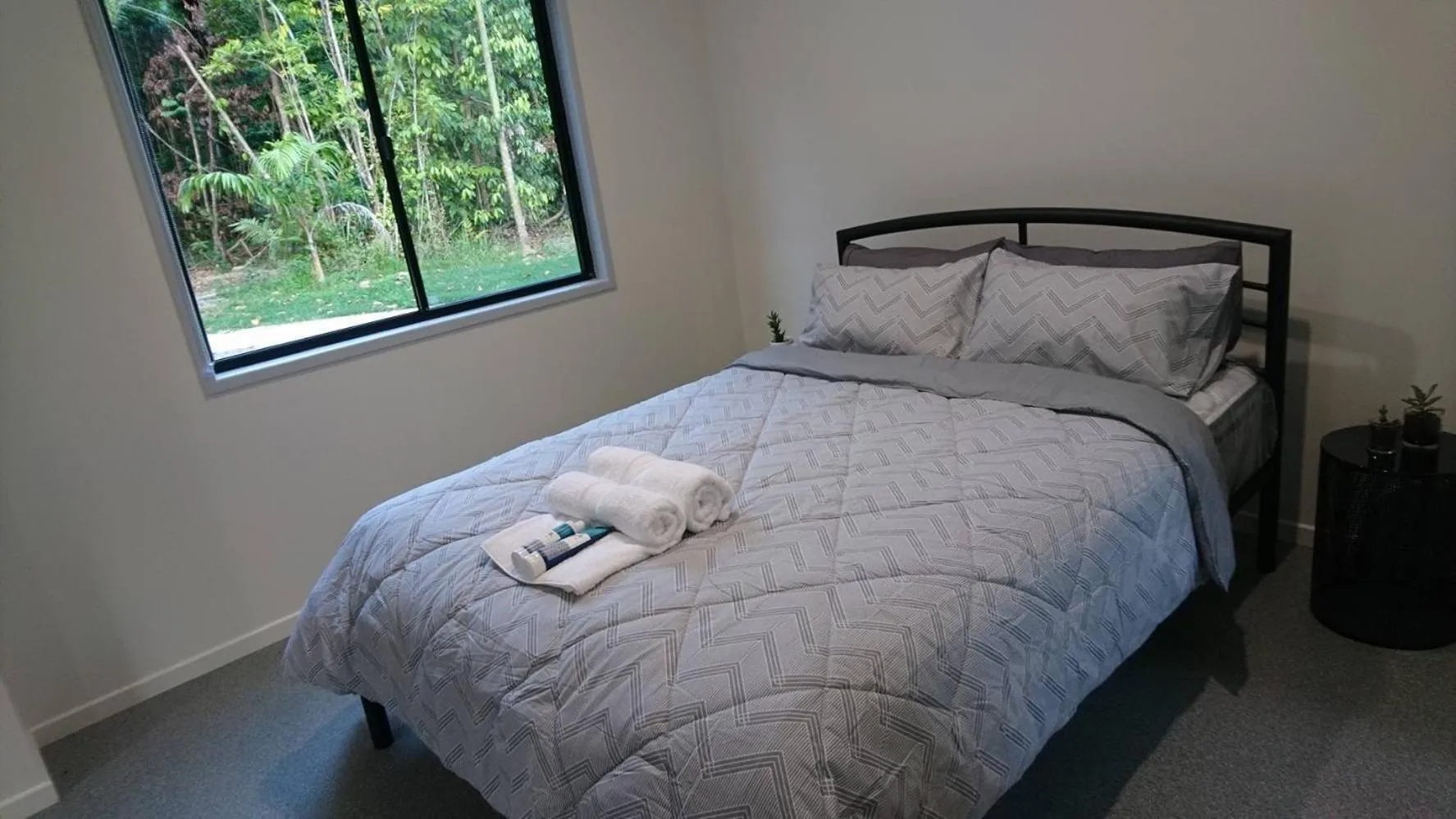 Bed in Daintree Peaks ECO Stays
