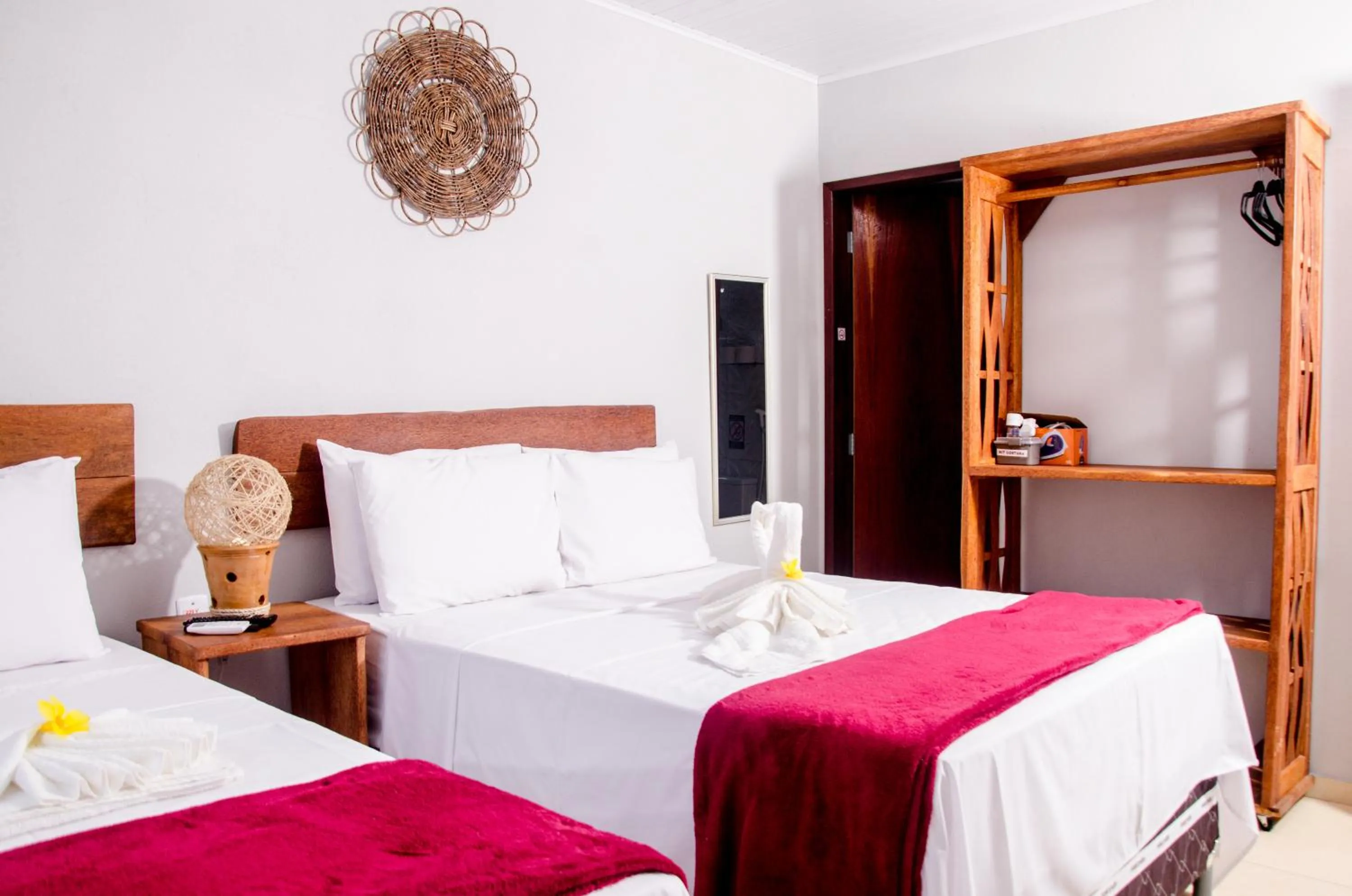 Bed in Pousada Chalés do Toque