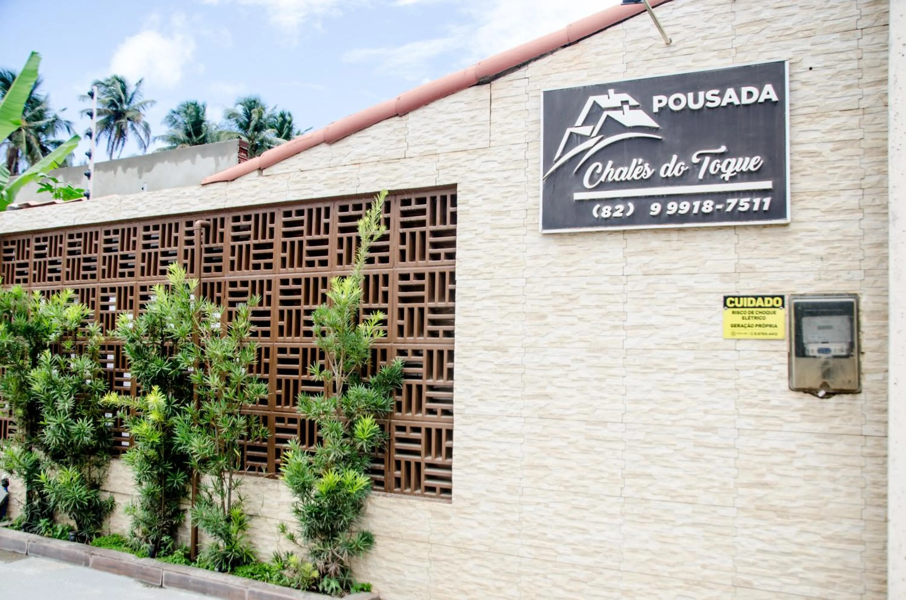 Property logo or sign in Pousada Chalés do Toque