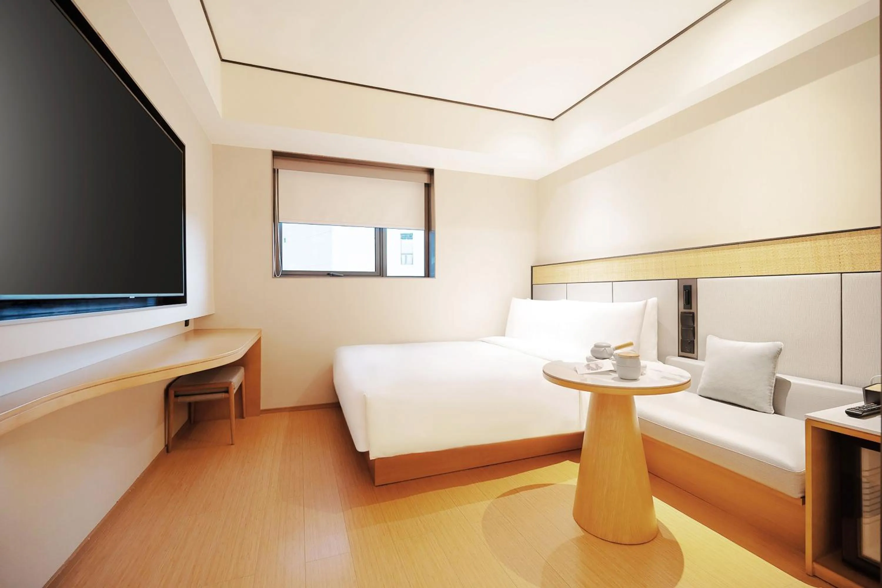 Bed in Ji Hotel Orchard Singapore